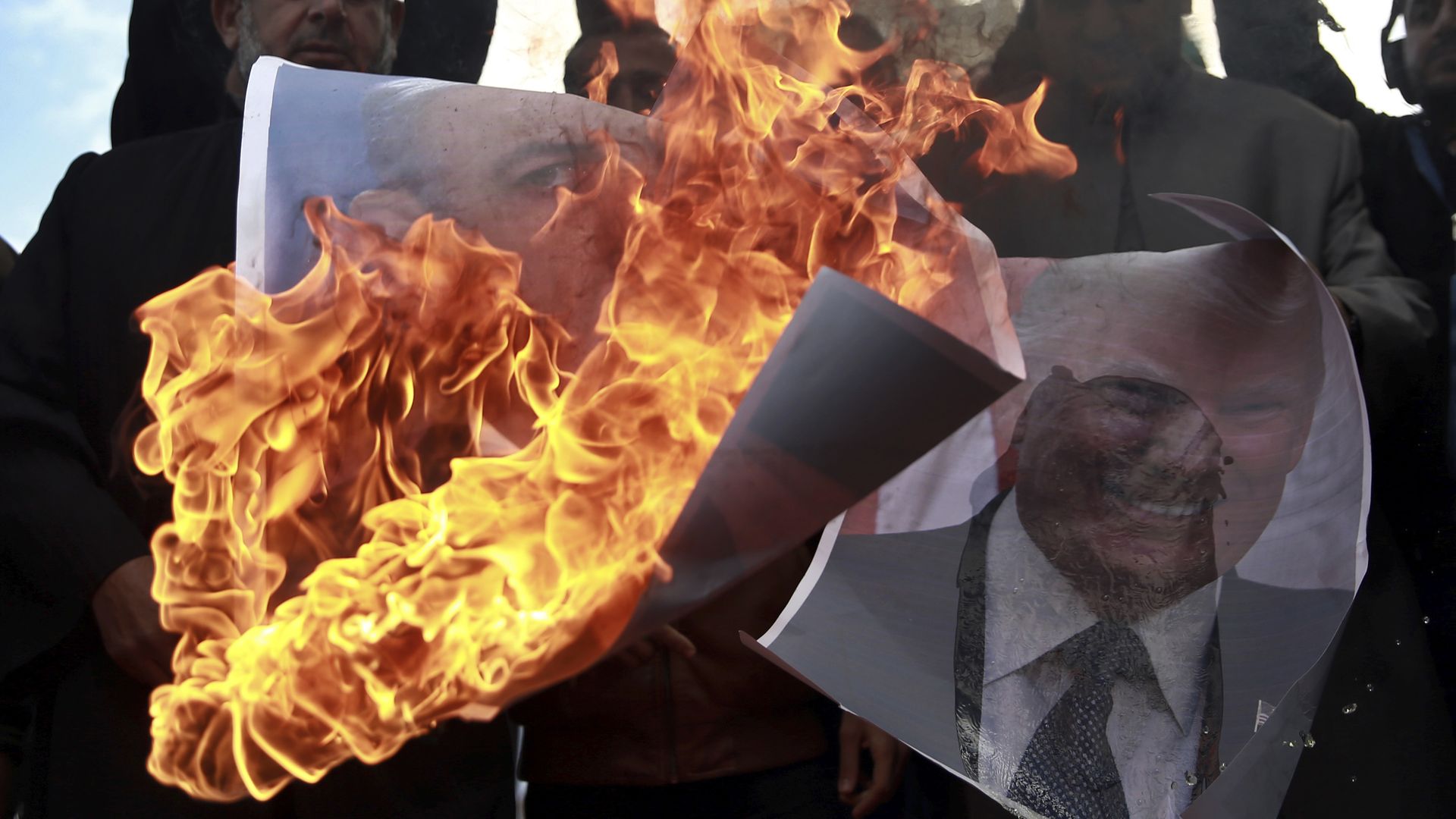 Palestinians burn pictures of Donald Trump and Israeli PM Netanyahu