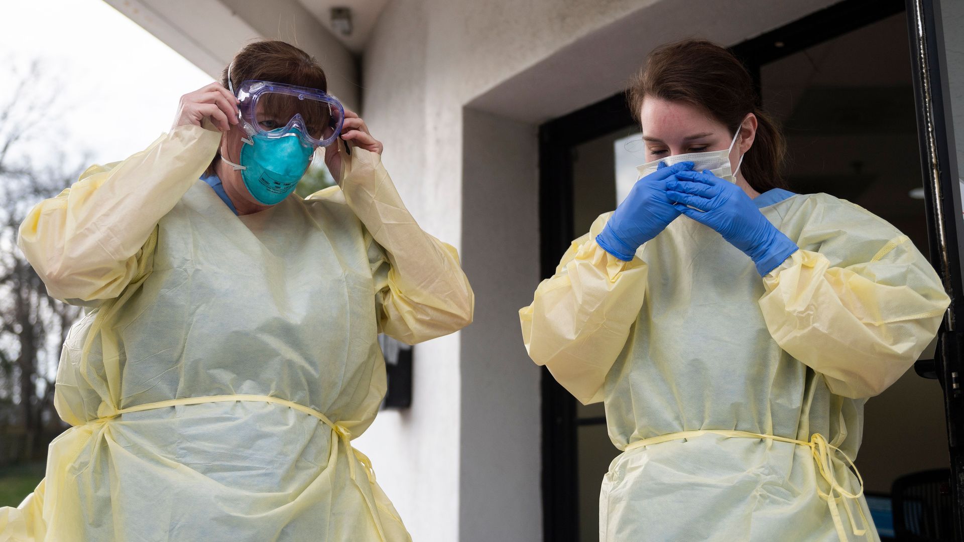 Health care workers from Virginia Hospital Center put on their personal protective equipment in Arlington County, Virginia. on March 20, 2020.
