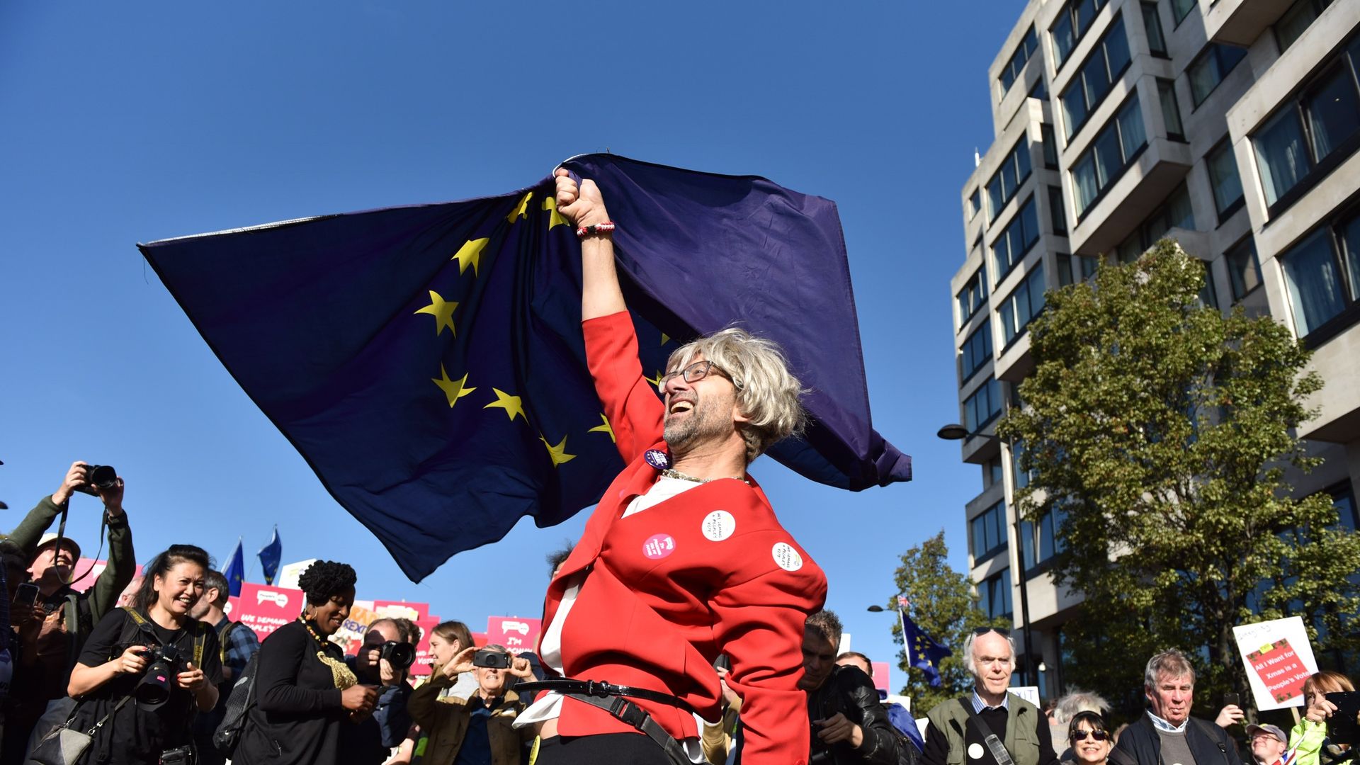 A protestor dressed as Theresa May 