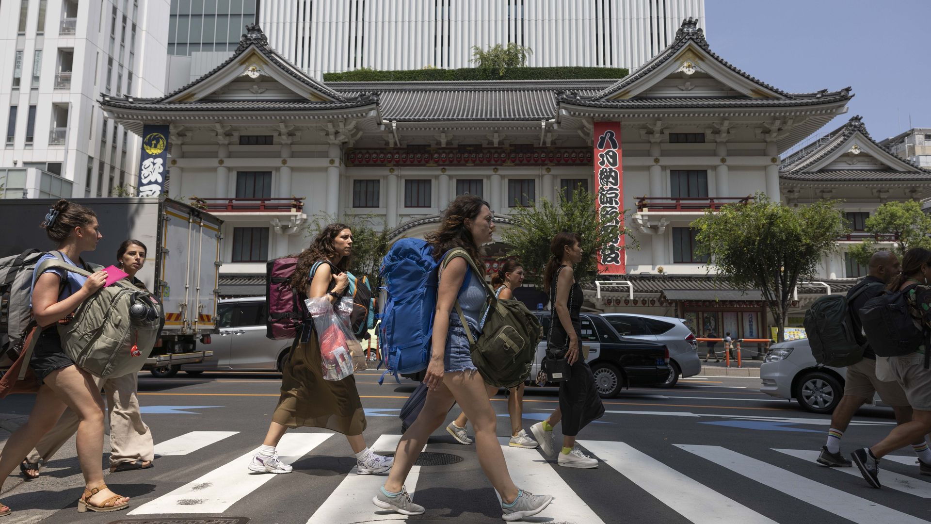 Tourists with backpacks in Tokyo