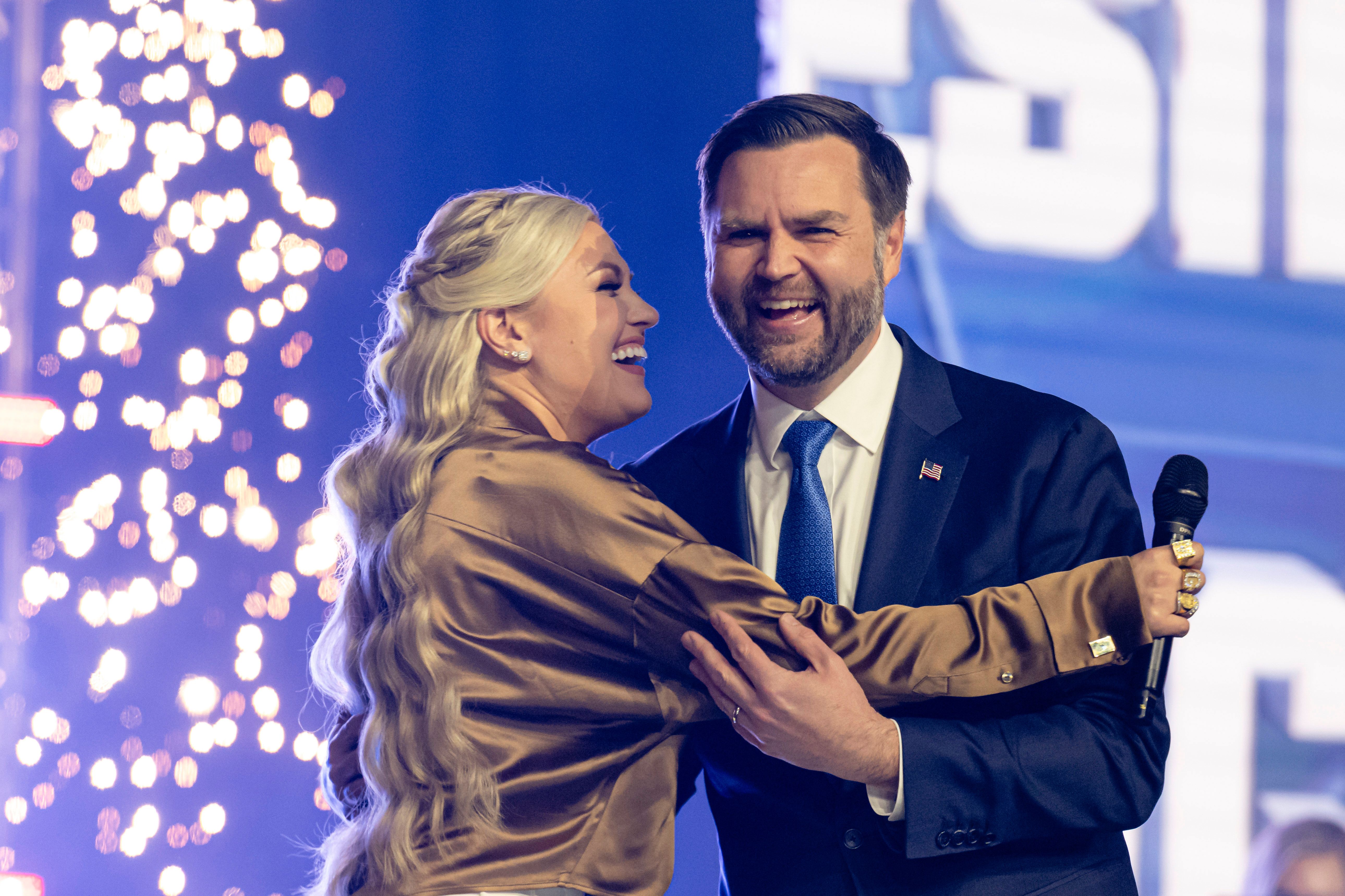 Erika Kirk greets Vice President JD Vance during Turning Point USA's AmericaFest  in Phoenix on Dec.  21. Photo: Jon Cherry/AP