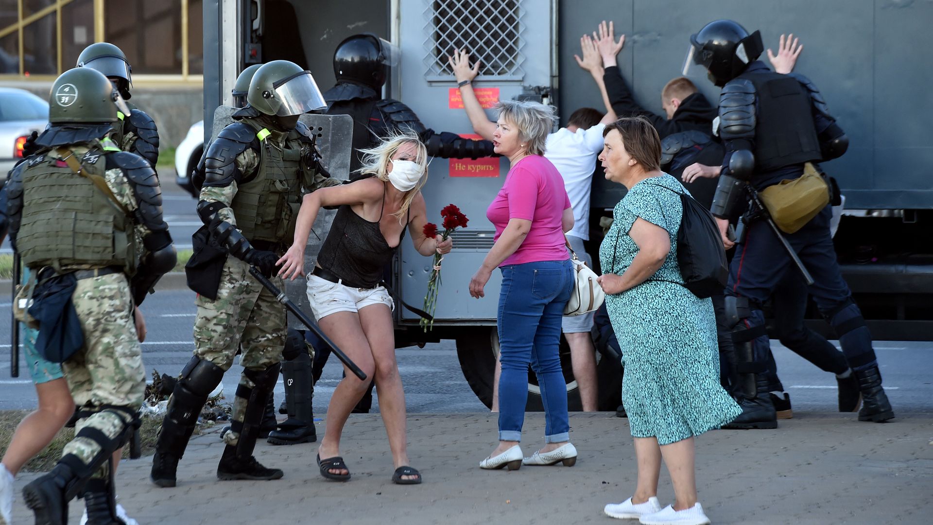Riot police detain protesters during a rally of opposition supporters, who accuse strongman Alexander Lukashenko of falsifying the polls