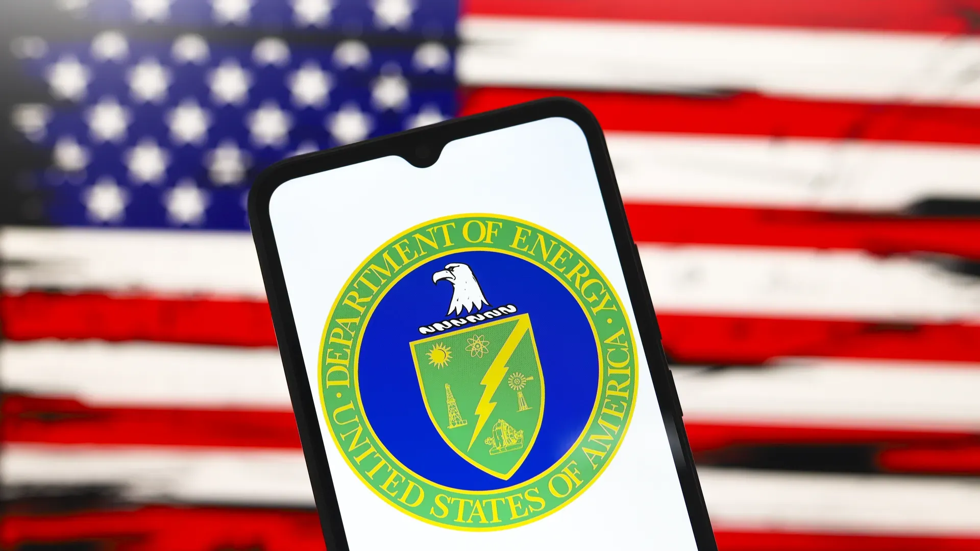 Photo of the Energy Department logo on a smartphone