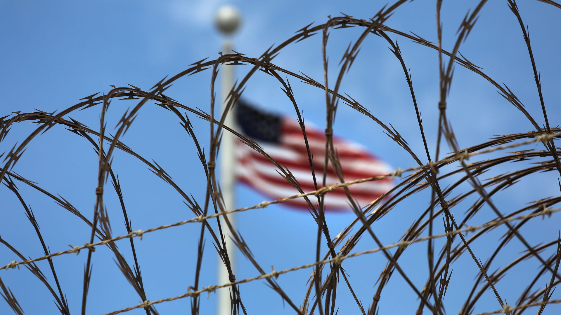 Razor wire tops the fence of the U.S. prison at Guantanamo Bay.