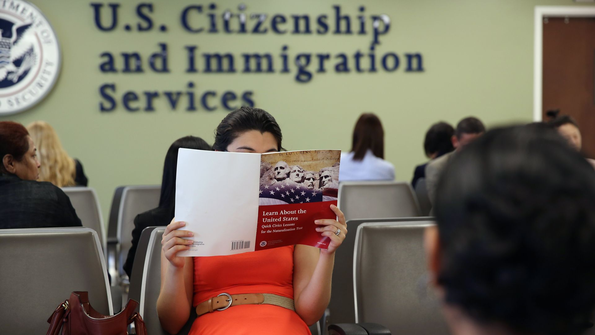 Colombian immigrant studies ahead of her citizenship exam at the U.S. Citizenship and Immigration Services (USCIS) Queens office on May 30, 2013 in New York City. 
