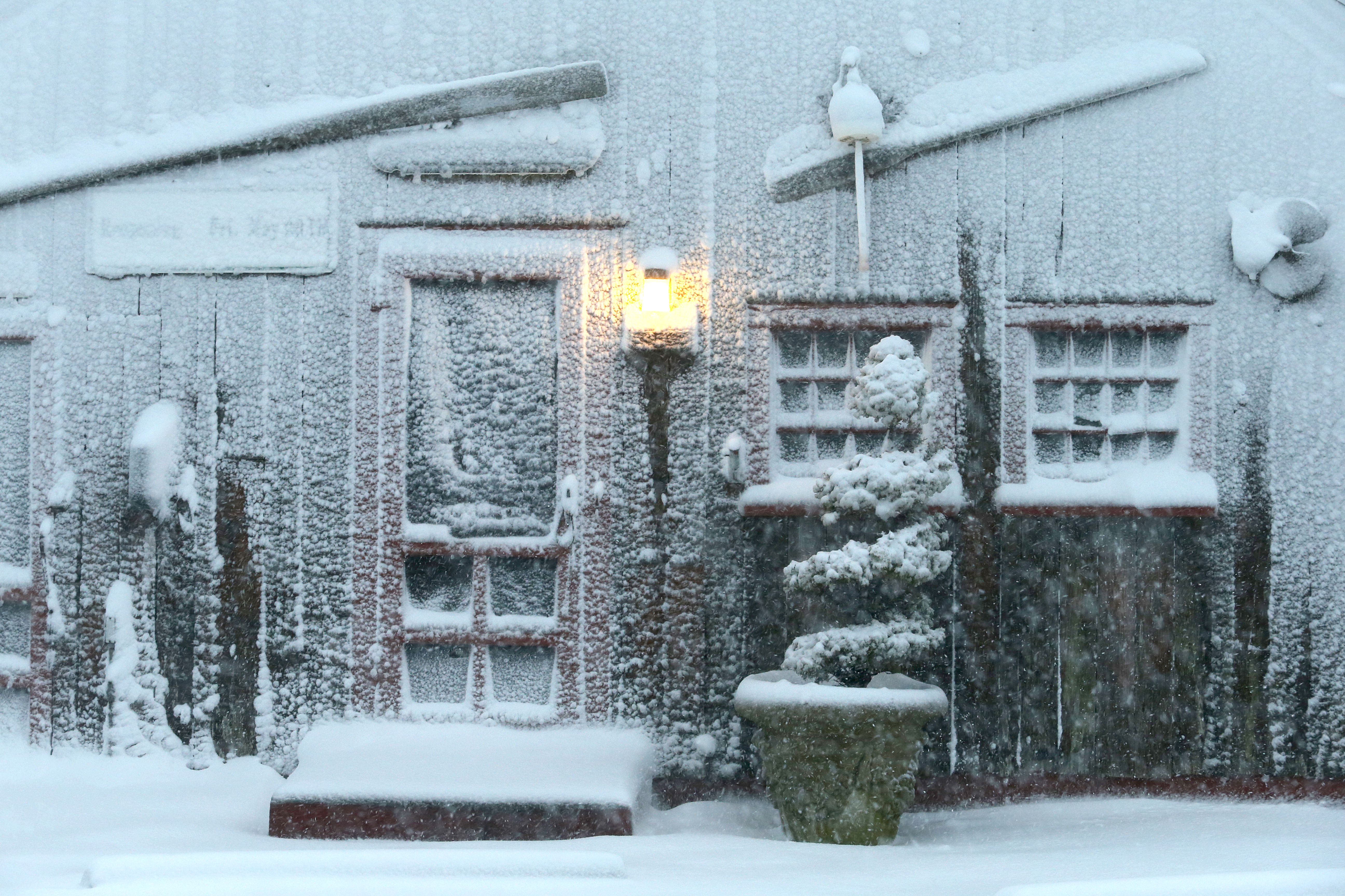 Entrance to Jim's Clam Shack during the snowstorm in Falmouth, MA on Jan. 29, 2022.