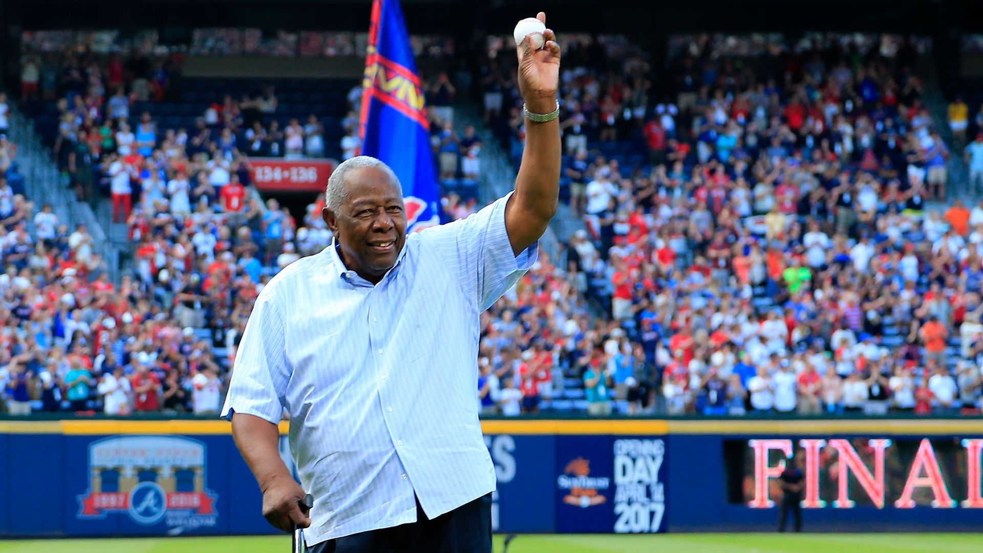 Hall of Famer Hank Aaron throws out the ceremonial last pitch at Turner Field to Bobby Cox after the game in 2016