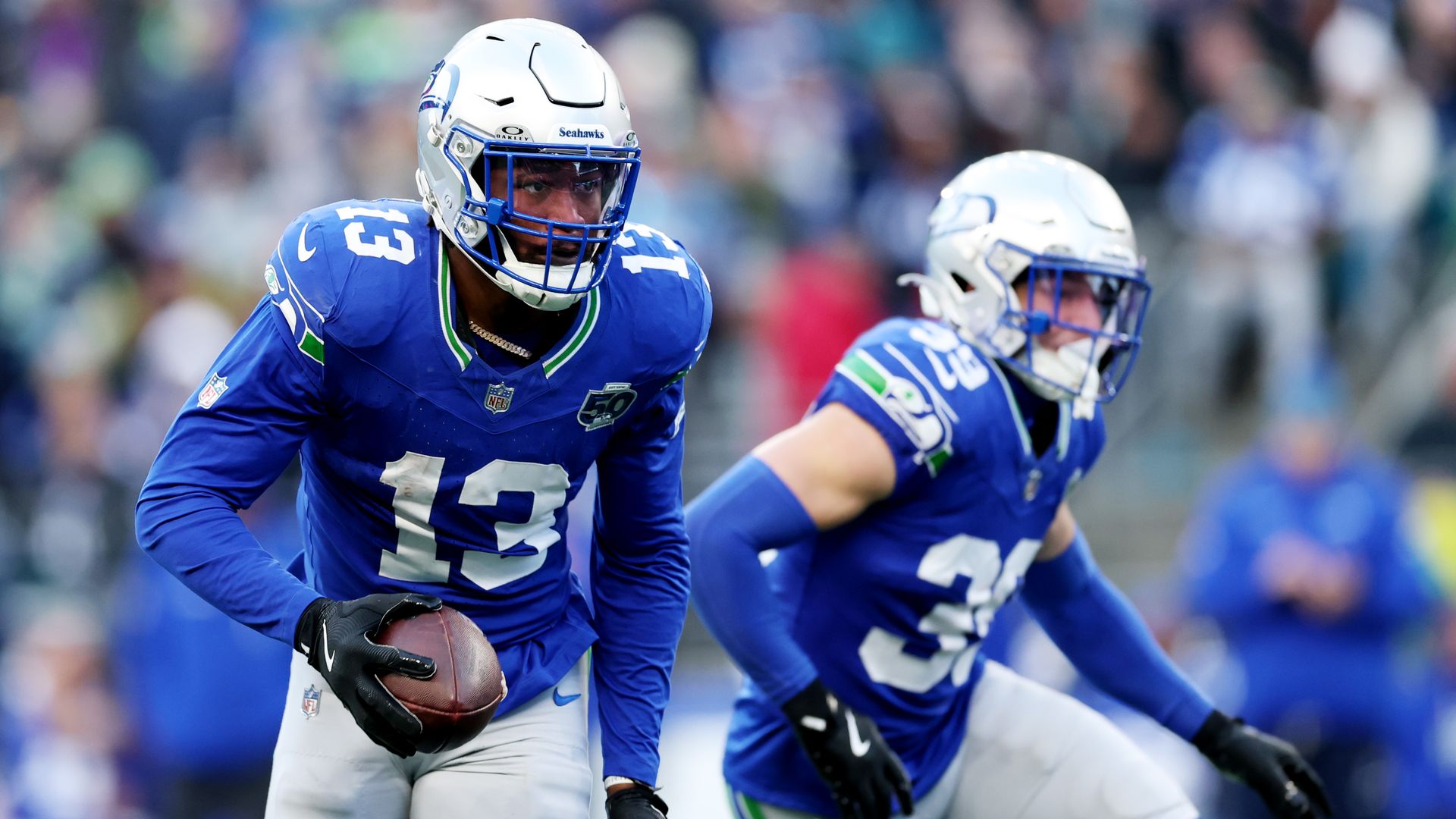 Ernest Jones #13 of the Seattle Seahawks intercepts a pass thrown by Max Brosmer #12 of the Minnesota Vikings during the fourth quarter at Lumen Field on November 30, 2025 in Seattle, Washington. (Photo by Steph Chambers/Getty Images)