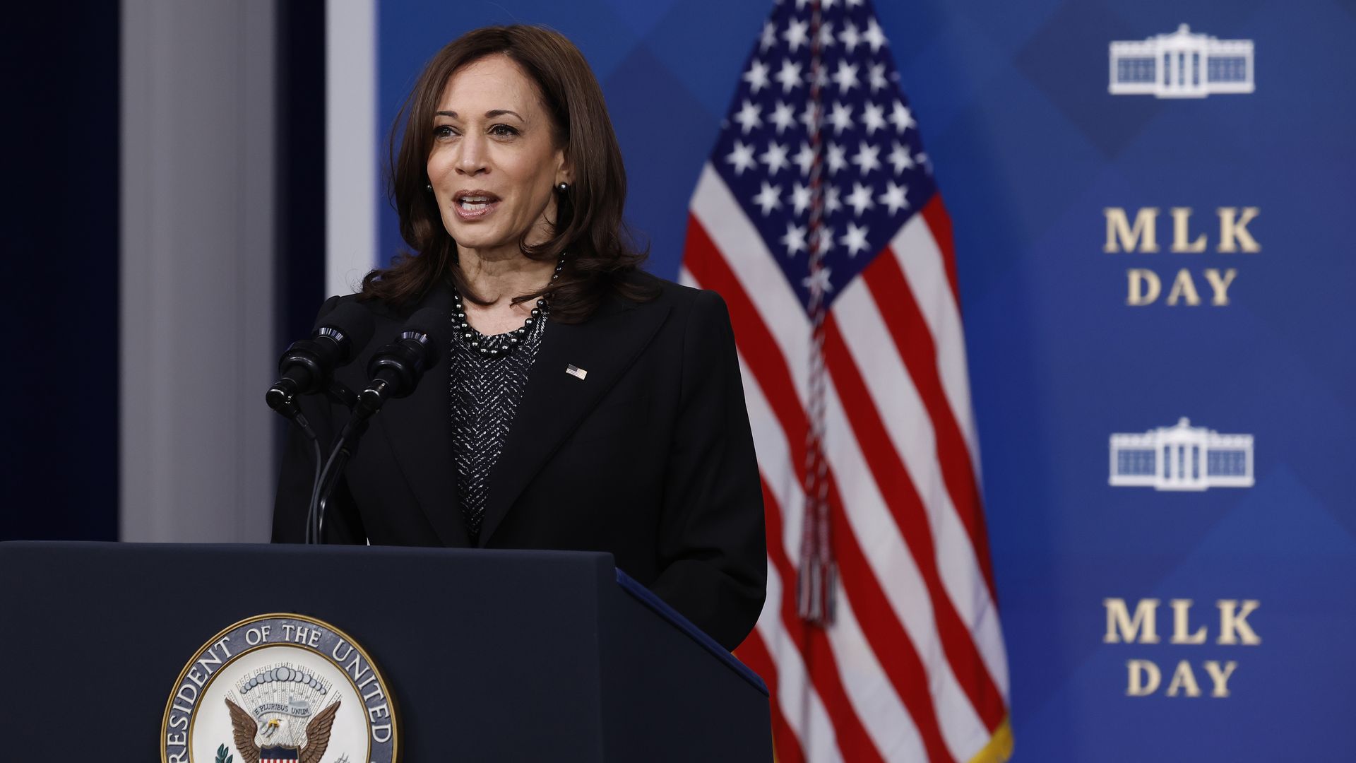 Picture of Kamala Harris speaking behind a podium