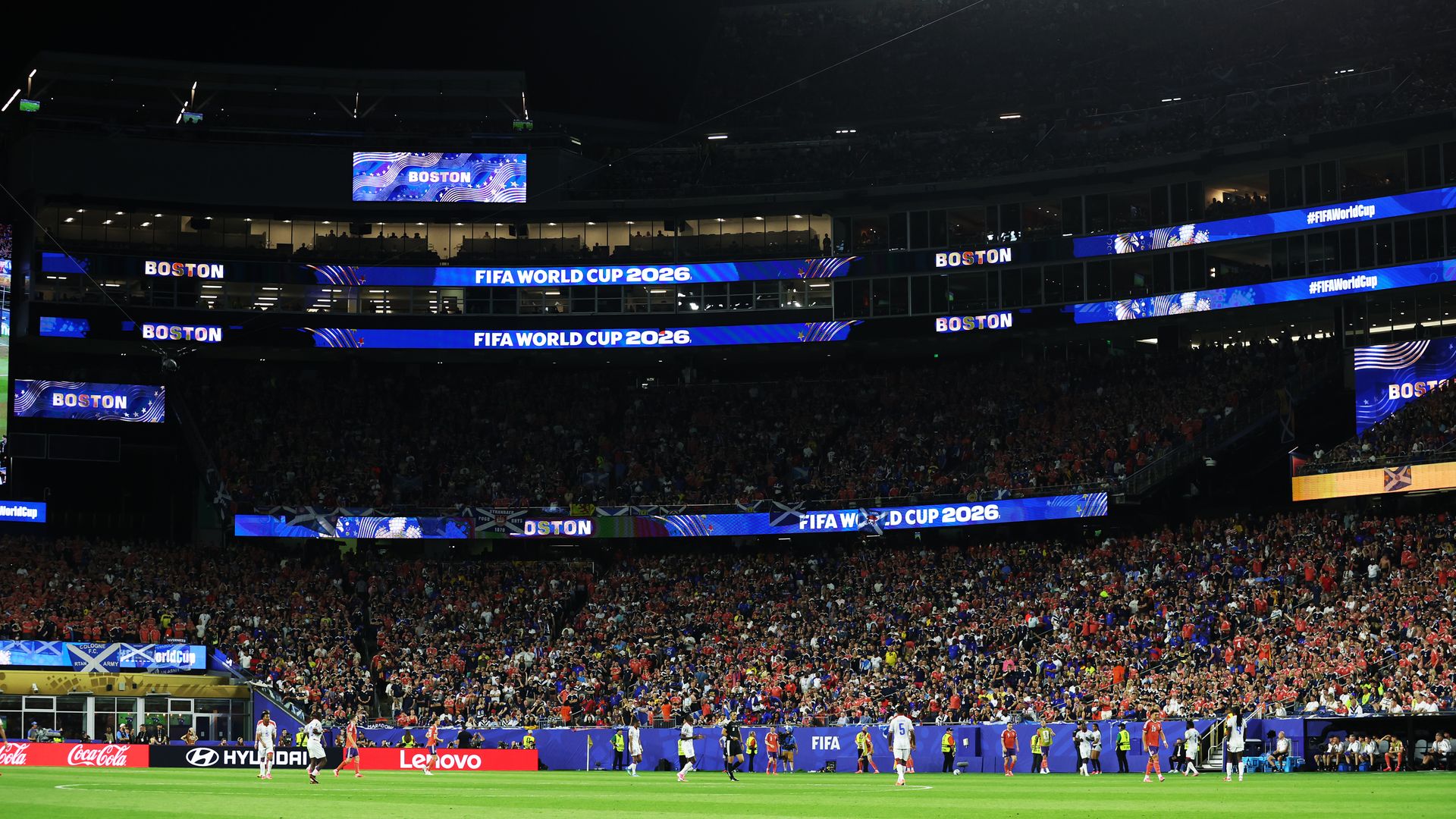 A nearly sold-out Gillette Stadium in Foxborough, which is being called Boston Stadium during the 2026 FIFA World Cup. Fans wave Haiti and Scotland fans as the teams face off Saturday, June 13, 2026.