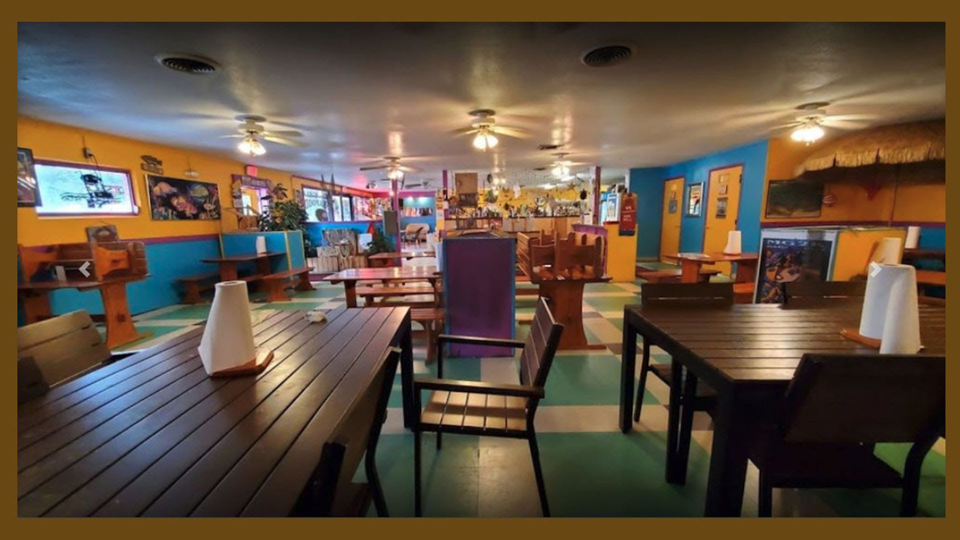 The faded blue and yellow interior of Penninsula Seafood.