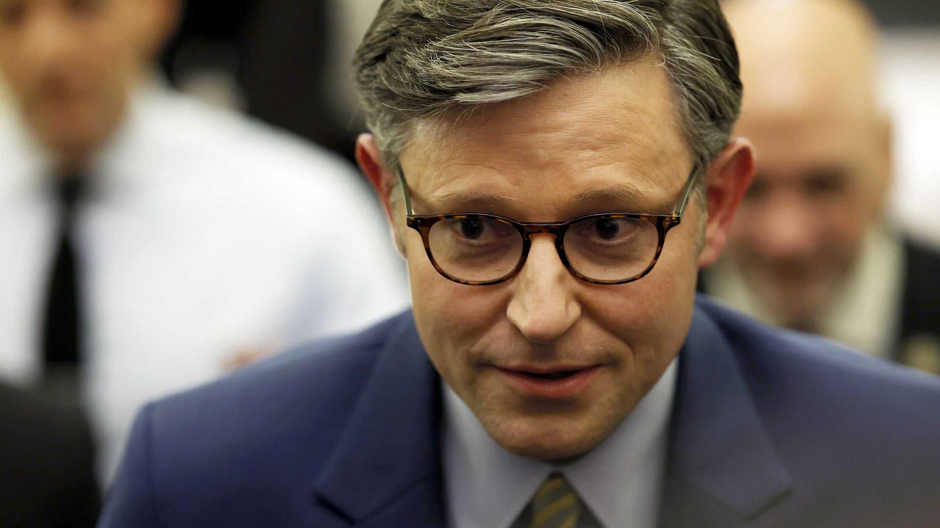 House Speaker Mike Johnson returns to the Capitol after a meeting at the White House