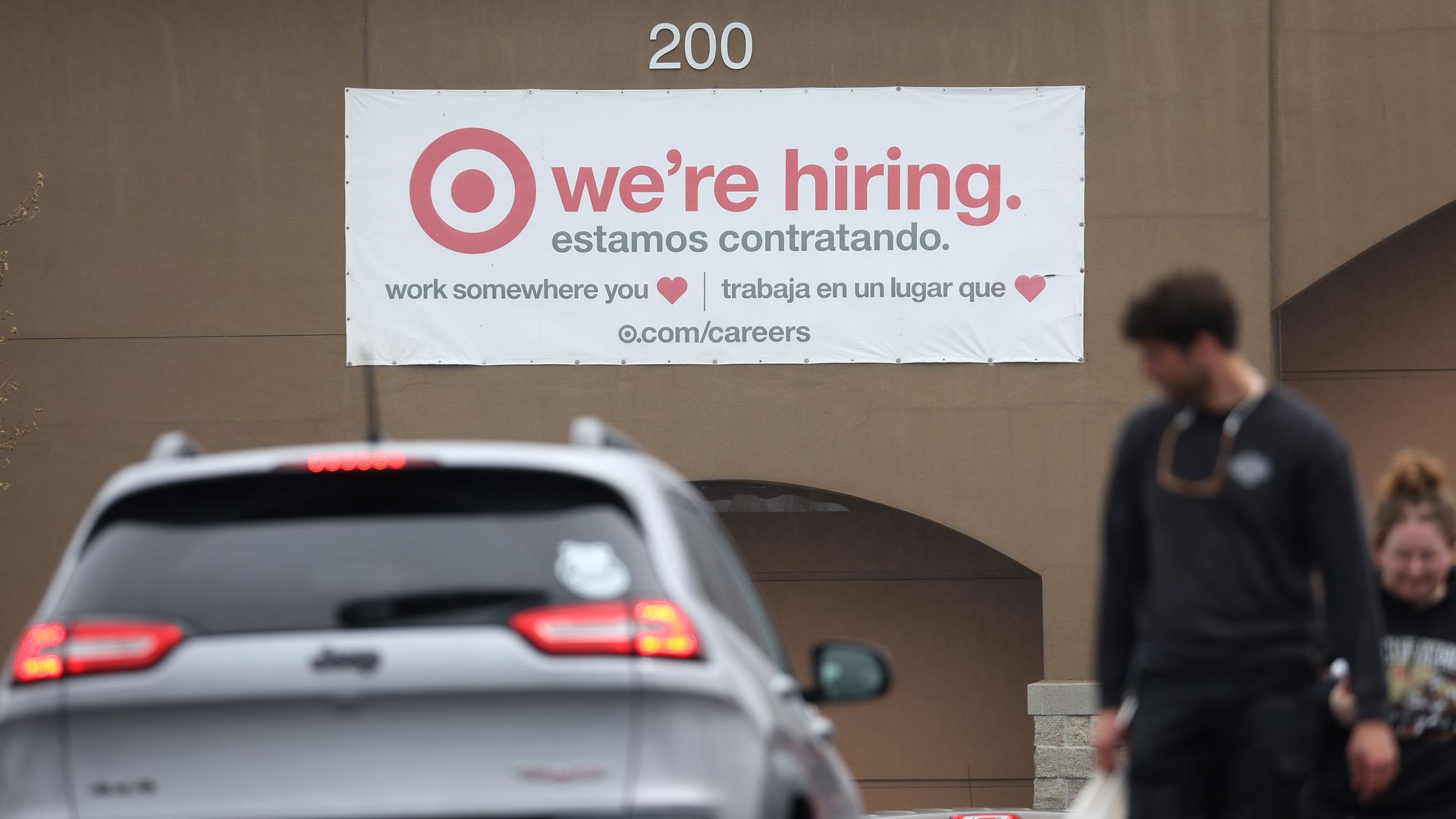 A "we're hiring sign" in front of a Target store