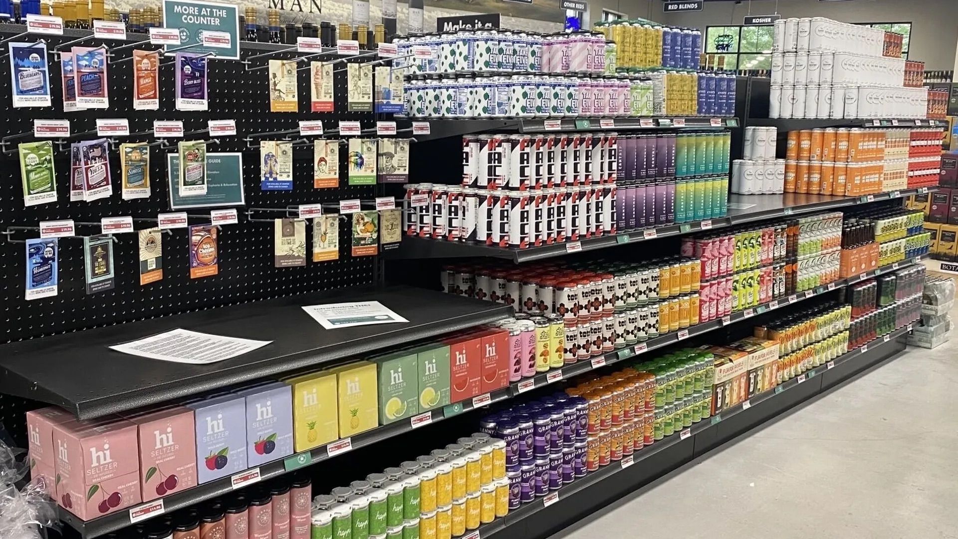 A shelf full of THC drinks.