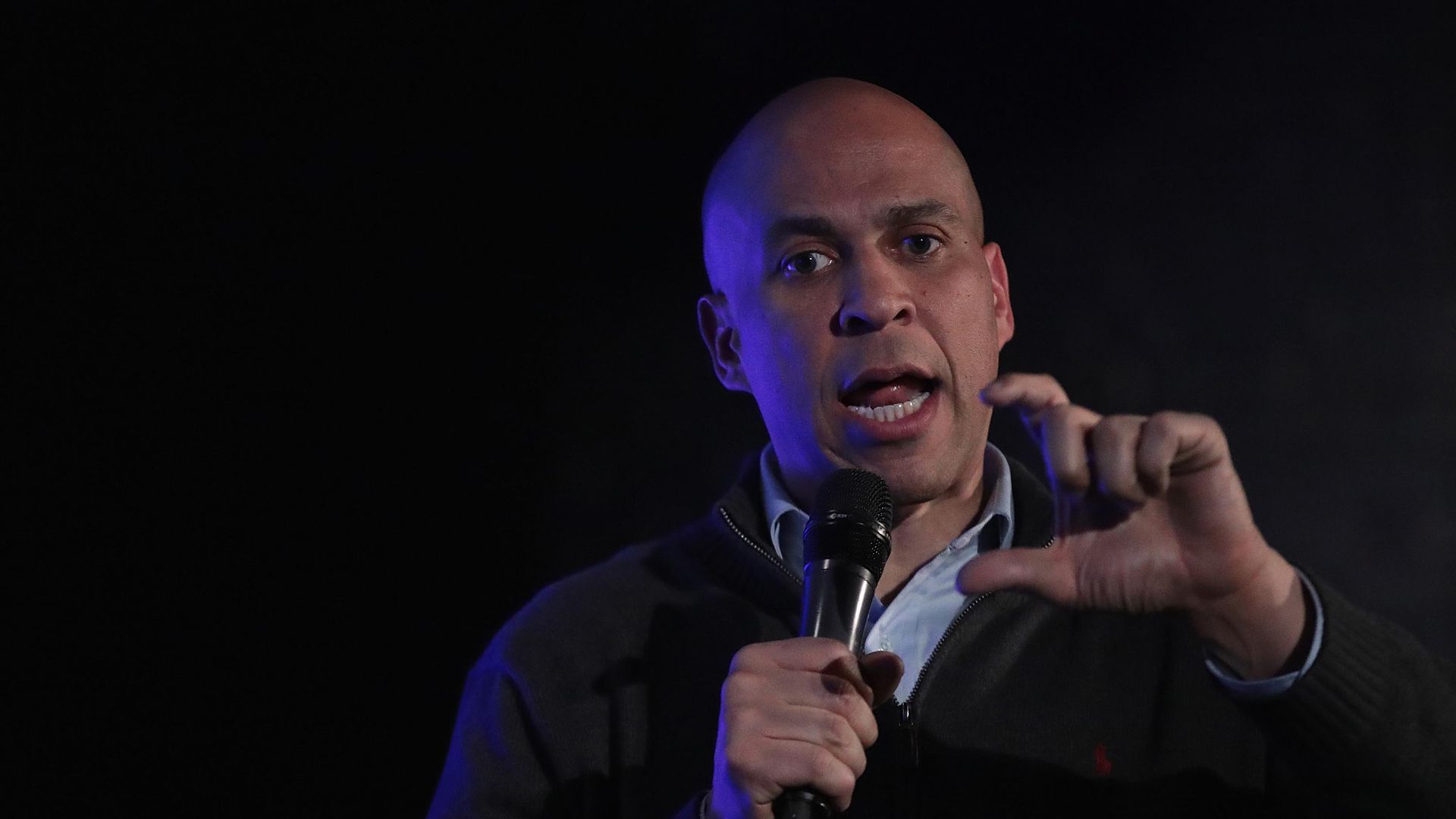 cory booker talking into a mircrophone