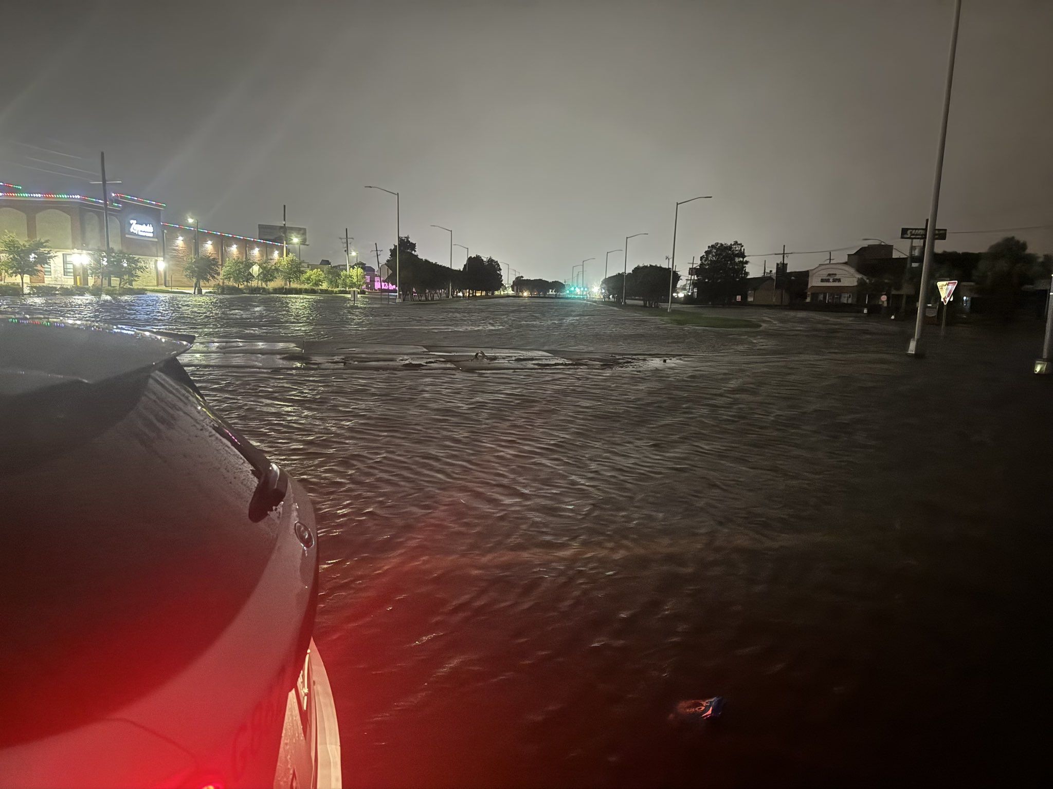 Street flooding at an intersection.