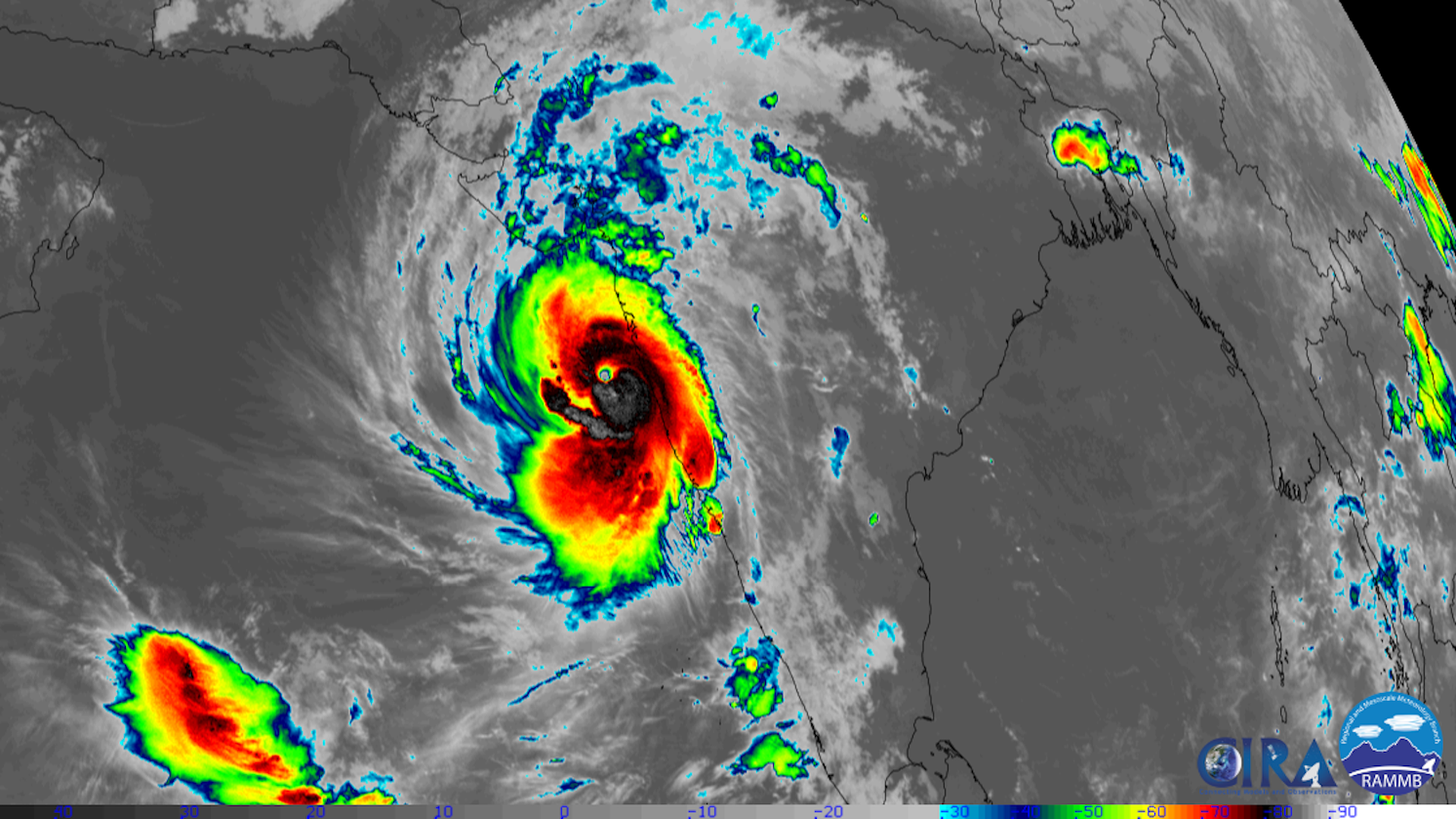 Satellite image showing a tropical cyclone with an eye moving along west coast of India.