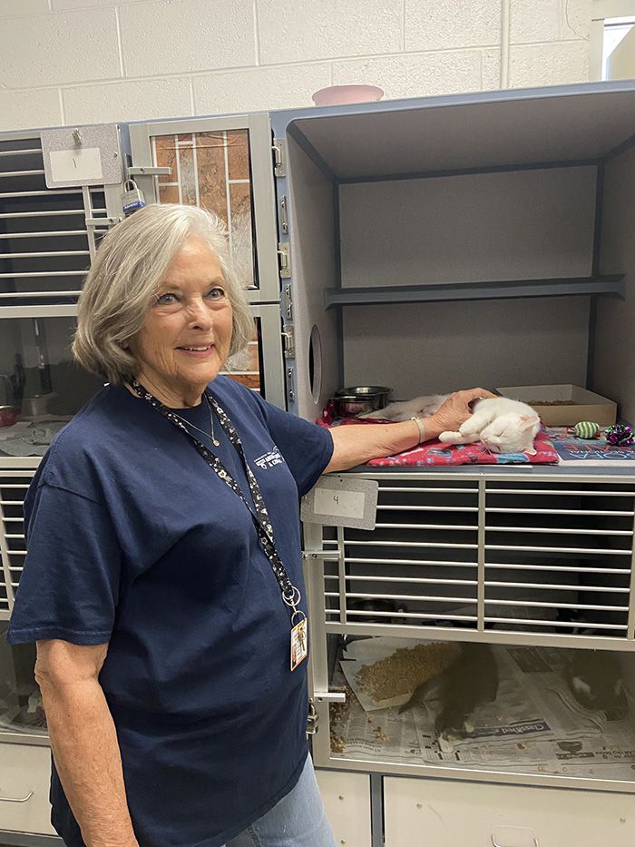 AC&C volunteer Kathy Clarke and Luna. Photo: Ashley Mahoney/Axios