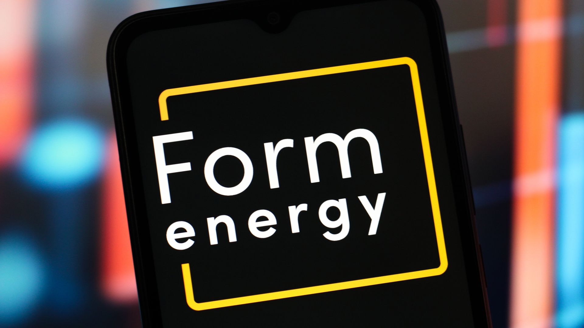 The Form Energy logo is displayed on a darkened smartphone screen.