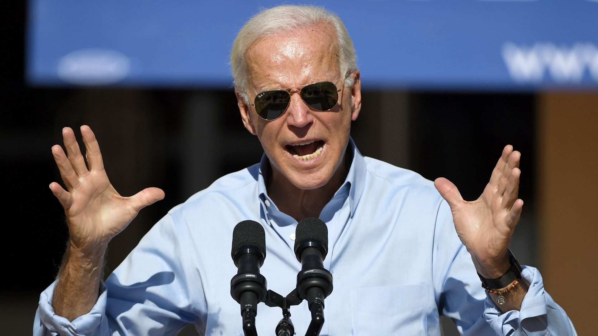 Biden with his hands up. 