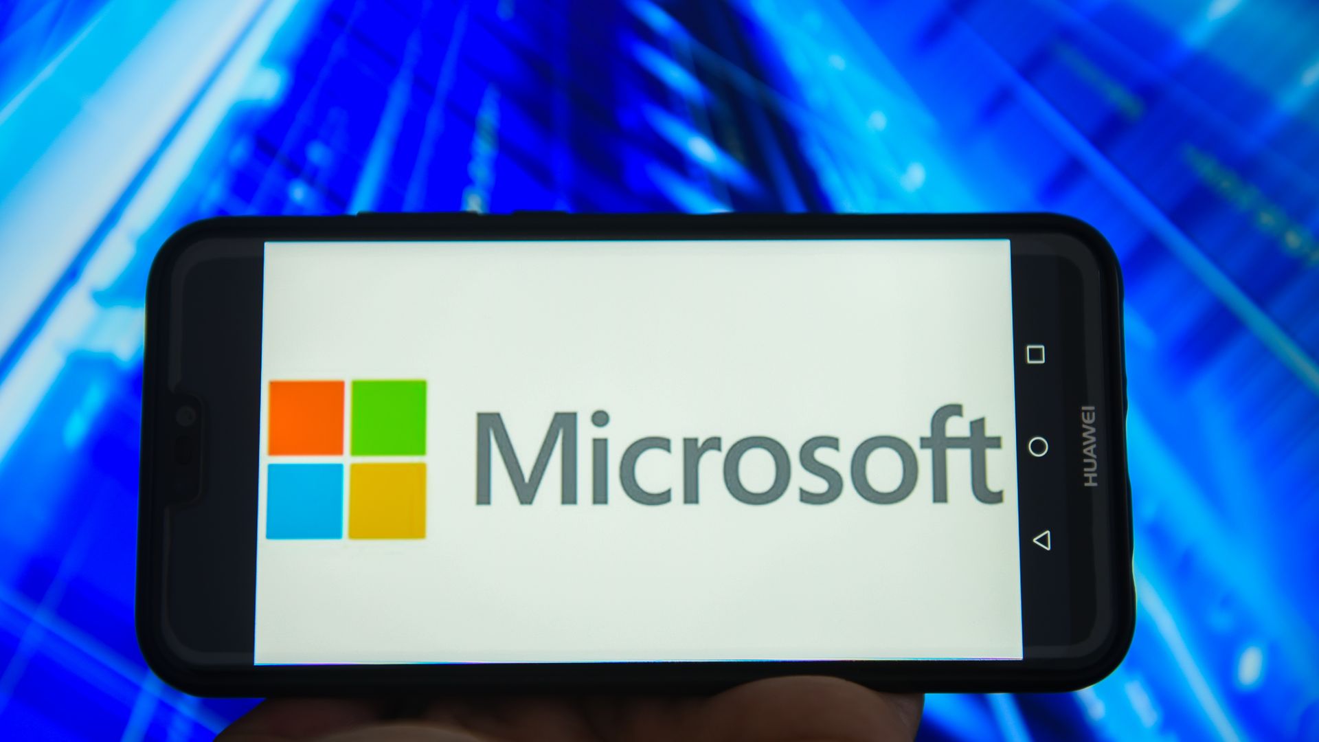 Microsoft logo on phone screen.