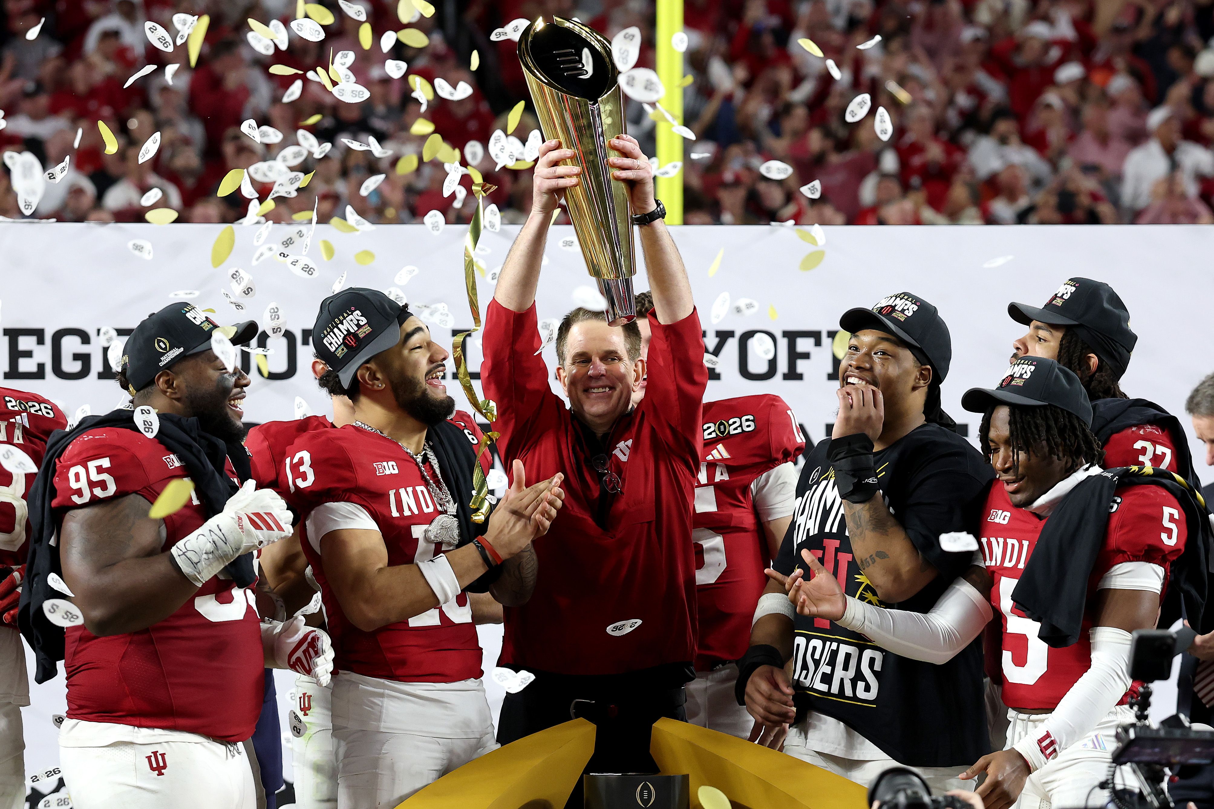 : Head coach Curt Cignetti of the Indiana Hoosiers hoists the College Football Playoff National Championship Trophy after defeating the Miami Hurricanes 27-21 in the 2026 College Football Playoff National Championship at Hard Rock Stadium on January 19, 2026 in Miami Gardens, Florida. (Photo by Jami