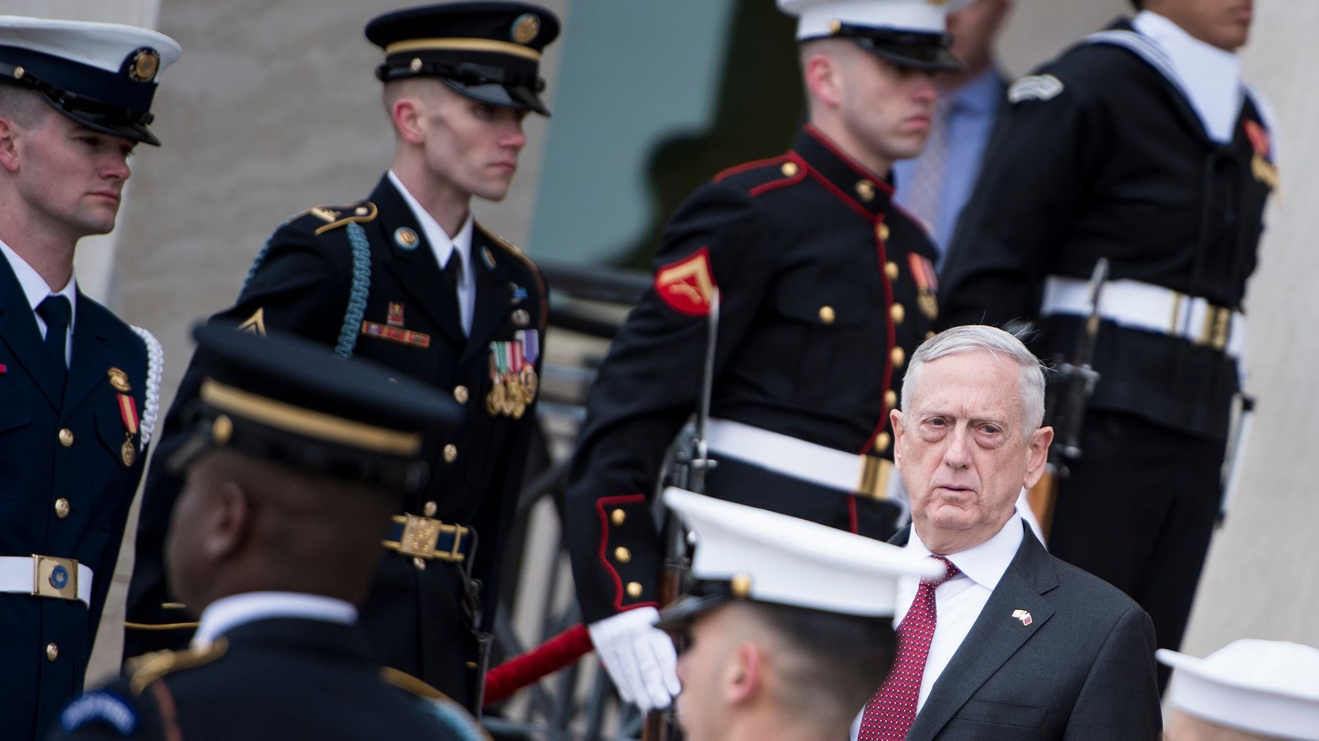 Mattis stands among soldiers