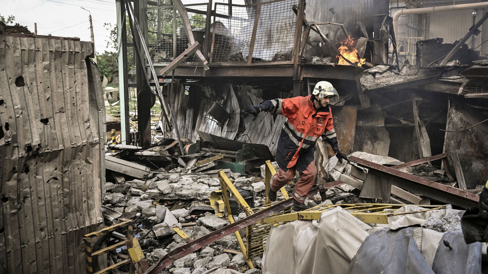 A fireman helping extinguish a fire in a factory in Bakhmut, Ukraine, struck by artillery on May 27.