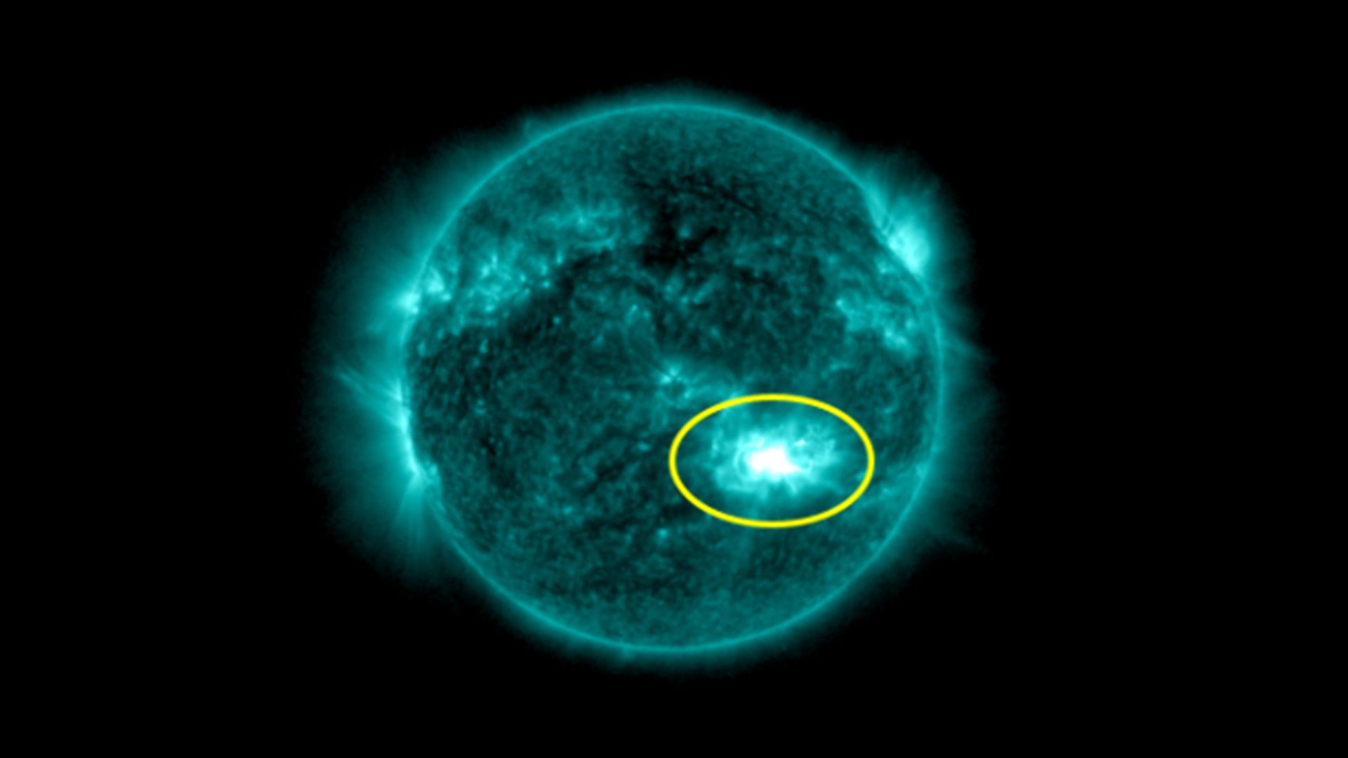An image of a solar flare from the sun, circled by NASA.