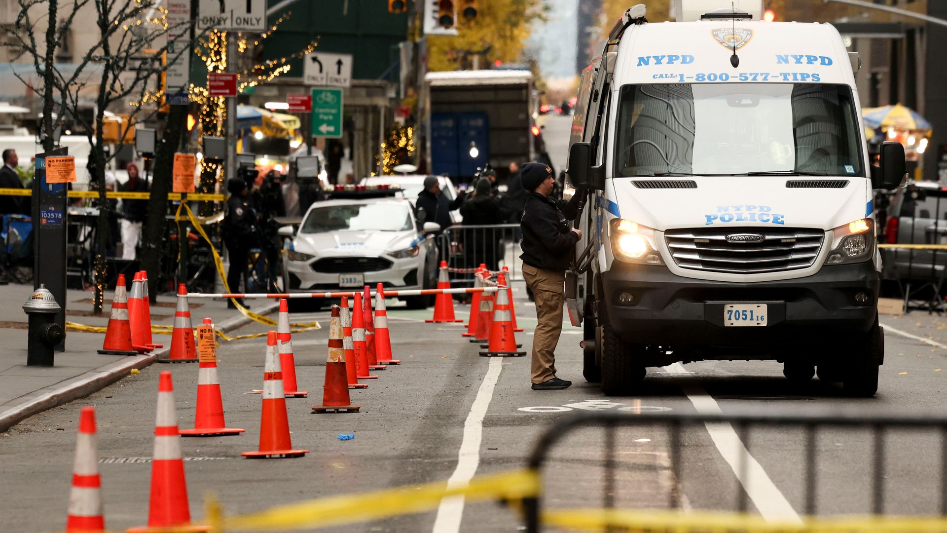 New York Police Department (NYPD) officers outside the New York Hilton Midtown in New York, US, on Wednesday, Dec. 4, 2024. Brian Thompson, a longtime UnitedHealth Group Inc. executive, was fatally shot in midtown Manhattan early Wednesday morning in what authorities described as a targeted attack t