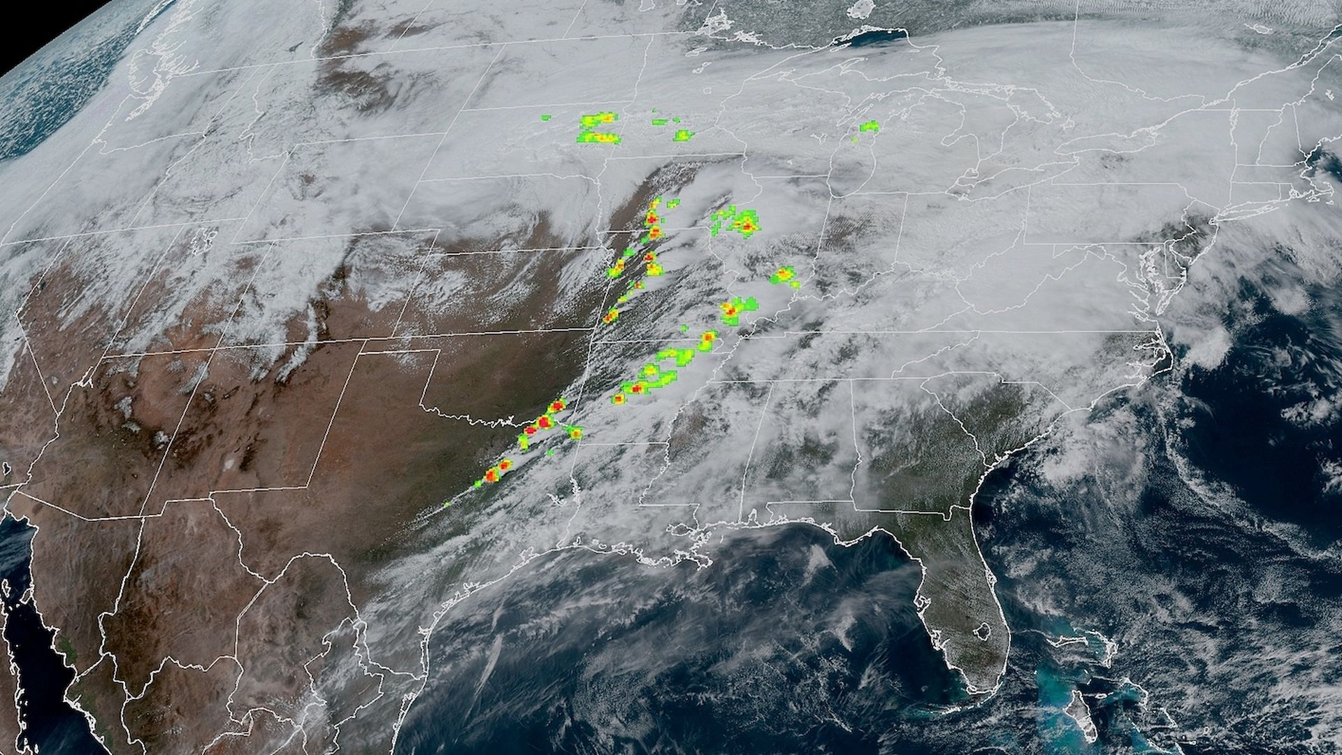 Satellite image showing clouds associated with severe thunderstorms and lightning flash density from a NOAA satellite on March 31.