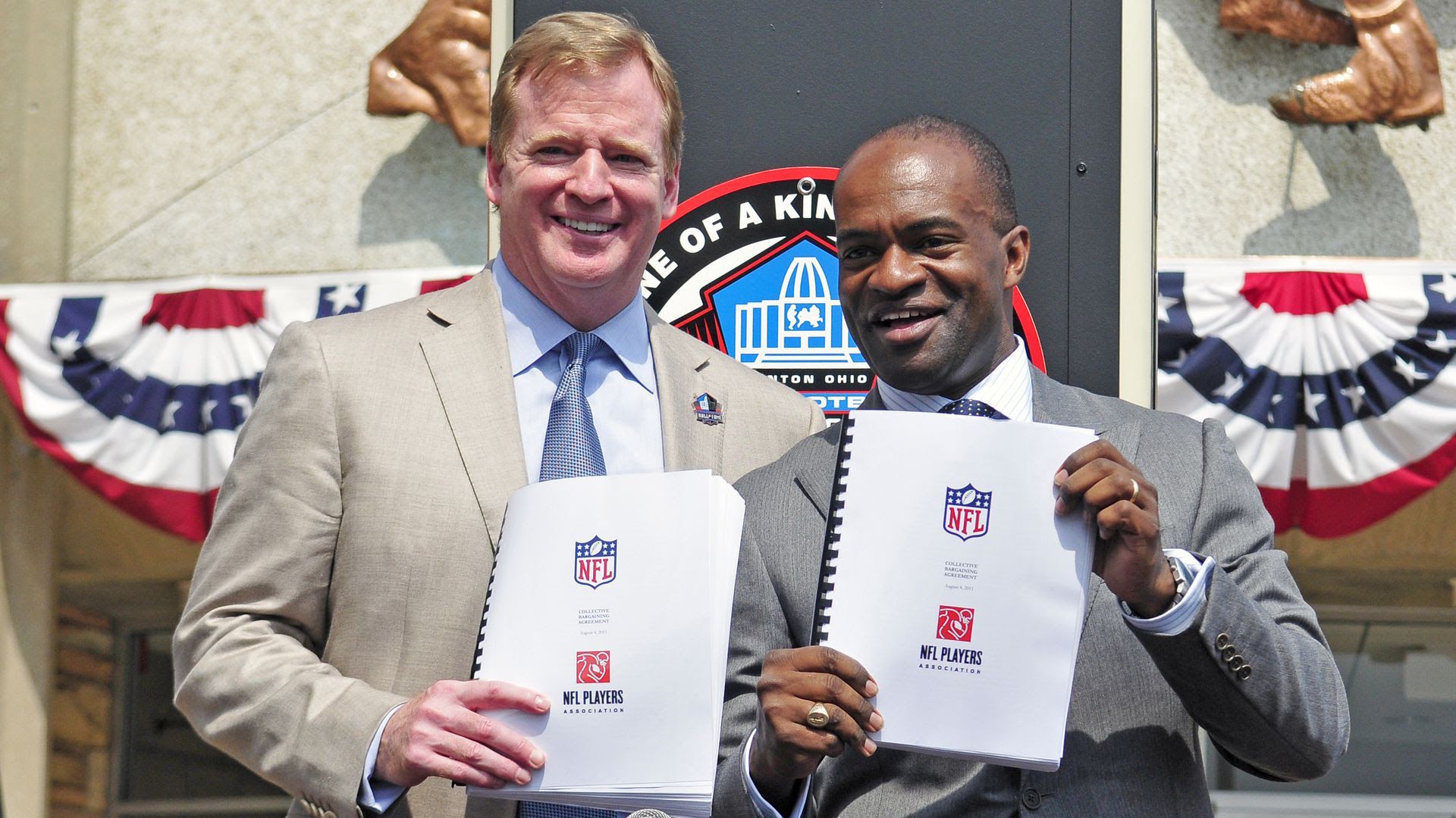 NFL commissioner Roger Goodell and NFLPA executive director Demaurice Smith after signing a new 10-year CBA in 2011. Photo: Jason Miller/Getty Images