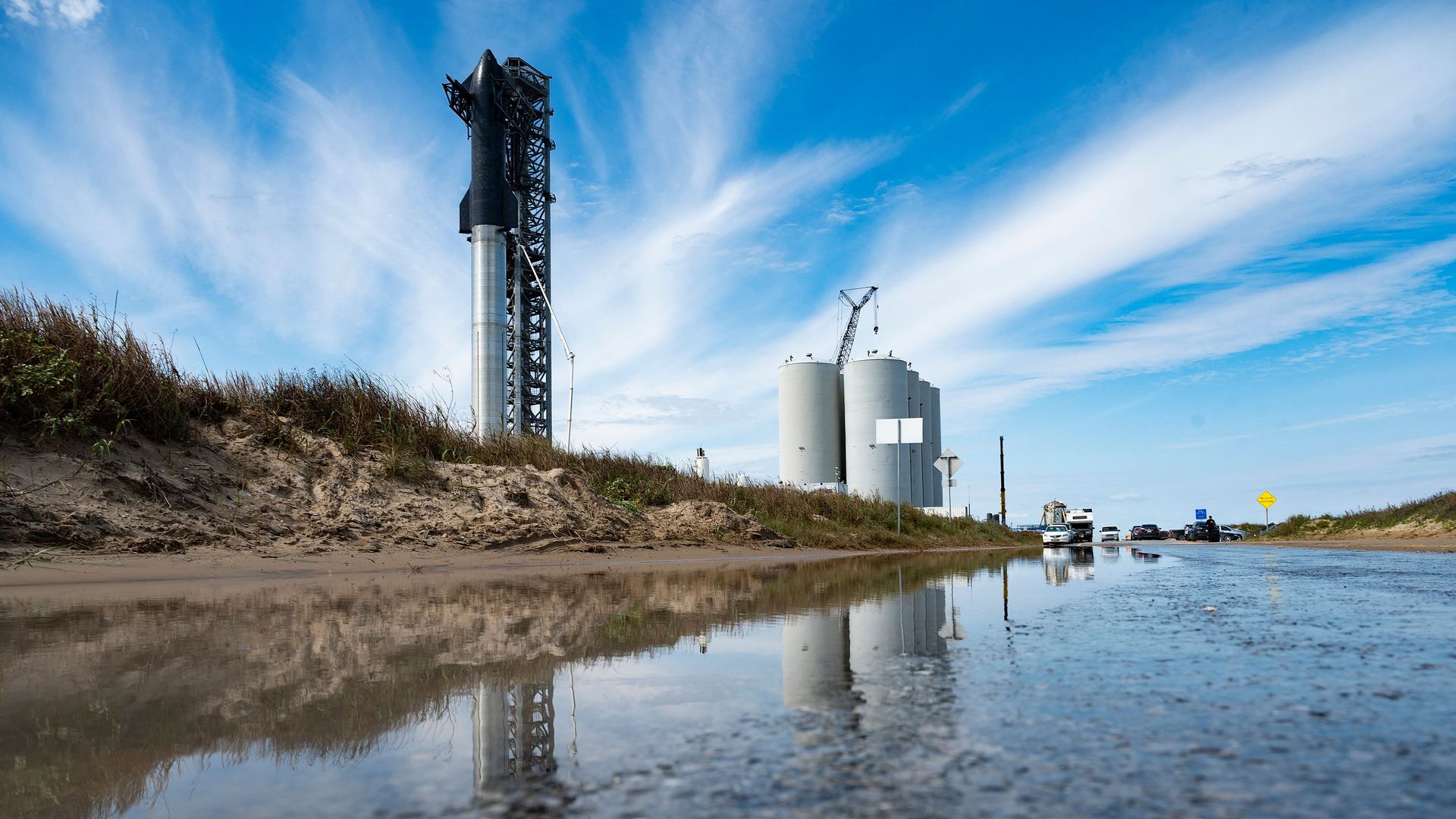 SpaceX's first orbital Starship SN20 is stacked atop its massive Super Heavy Booster 4 at the company's Starbase facility near Boca Chica Village in South Texas on February 10.