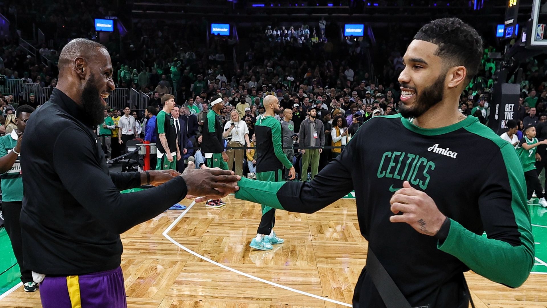 LeBron James #23 of the Los Angeles Lakers and Jayson Tatum #0 of the Boston Celtics before the game on March 8, 2025 at Cryto.com Arena in Los Angeles, California.