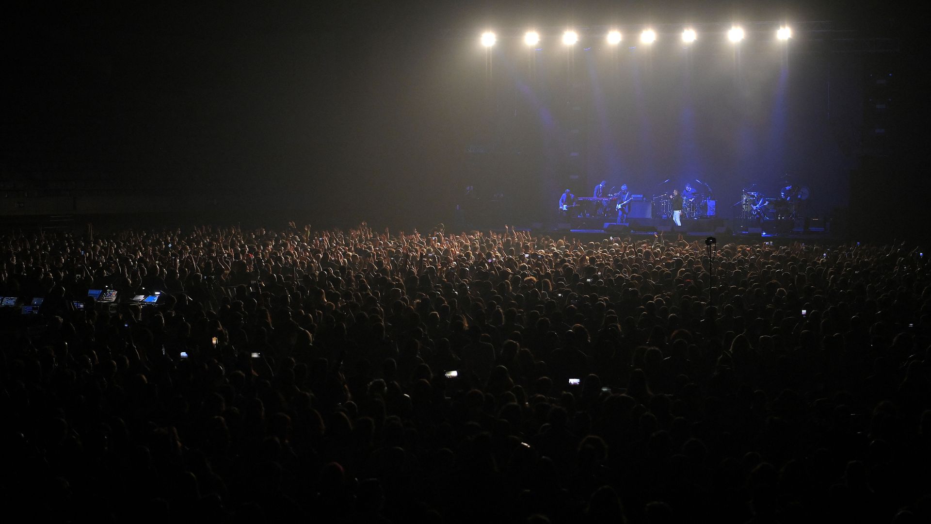  Spectators attend a rock music concert by Spanish group Love of Lesbian at the Palau Sant Jordi in Barcelona on March 27