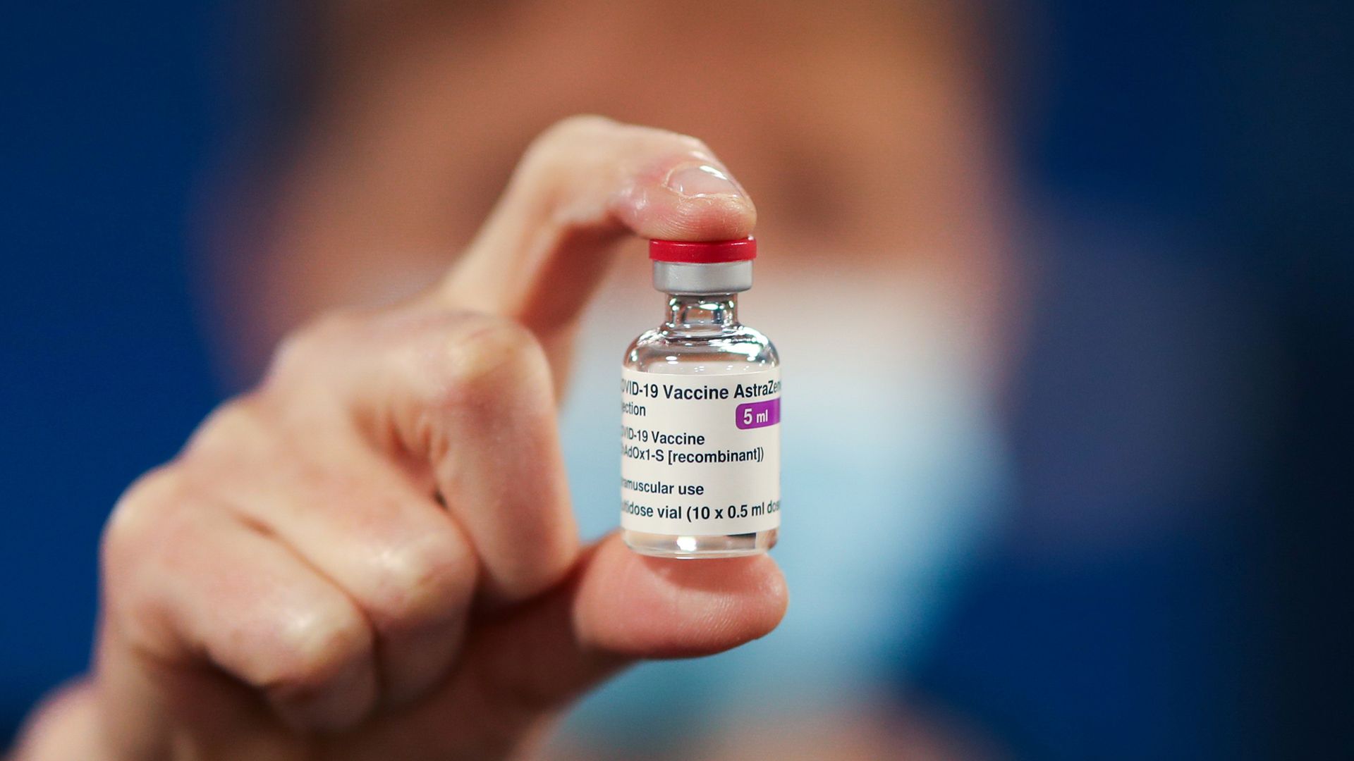 A healthcare worker holds a vial of AstraZeneca coronavirus disease (COVID-19) vaccine at the Pentland Medical Practice on January 7, 2021 in Currie, Scotland.