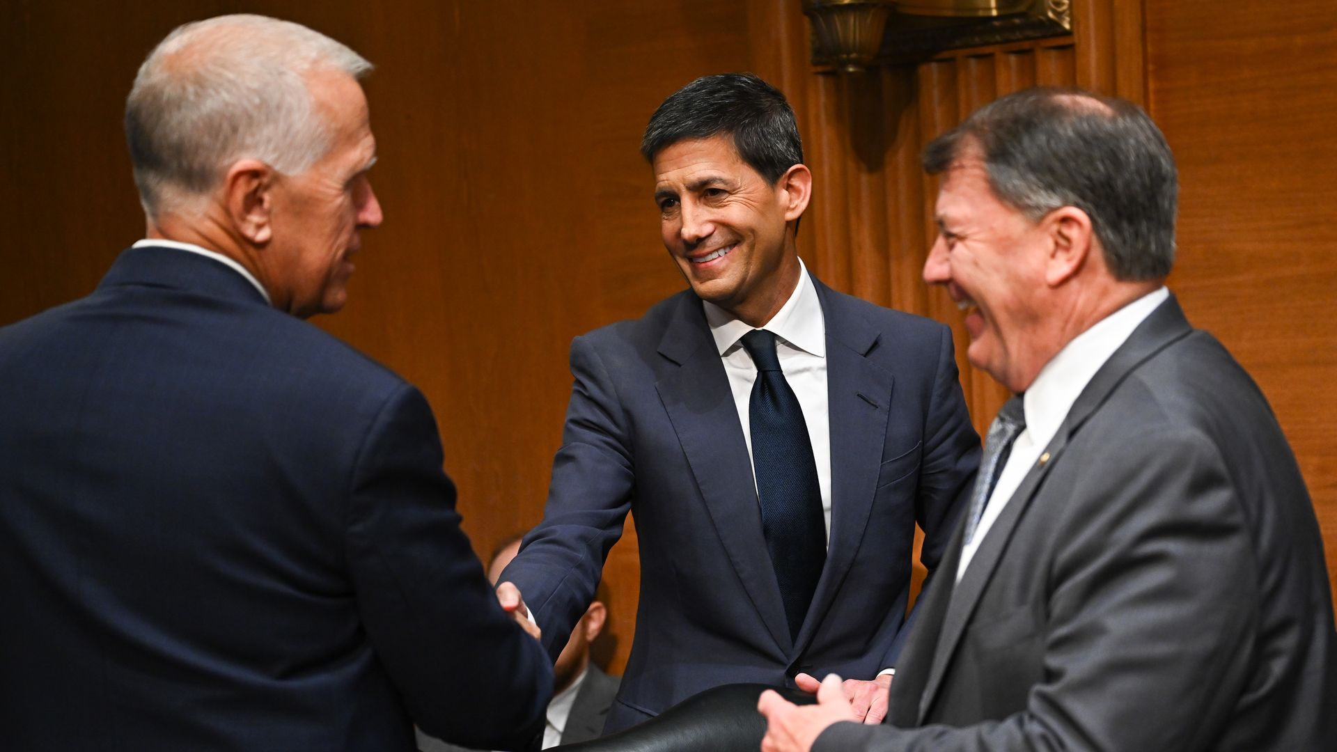 Sen. Thom Tillis (left) greets  Kevin Warsh at a confirmation hearing this week.