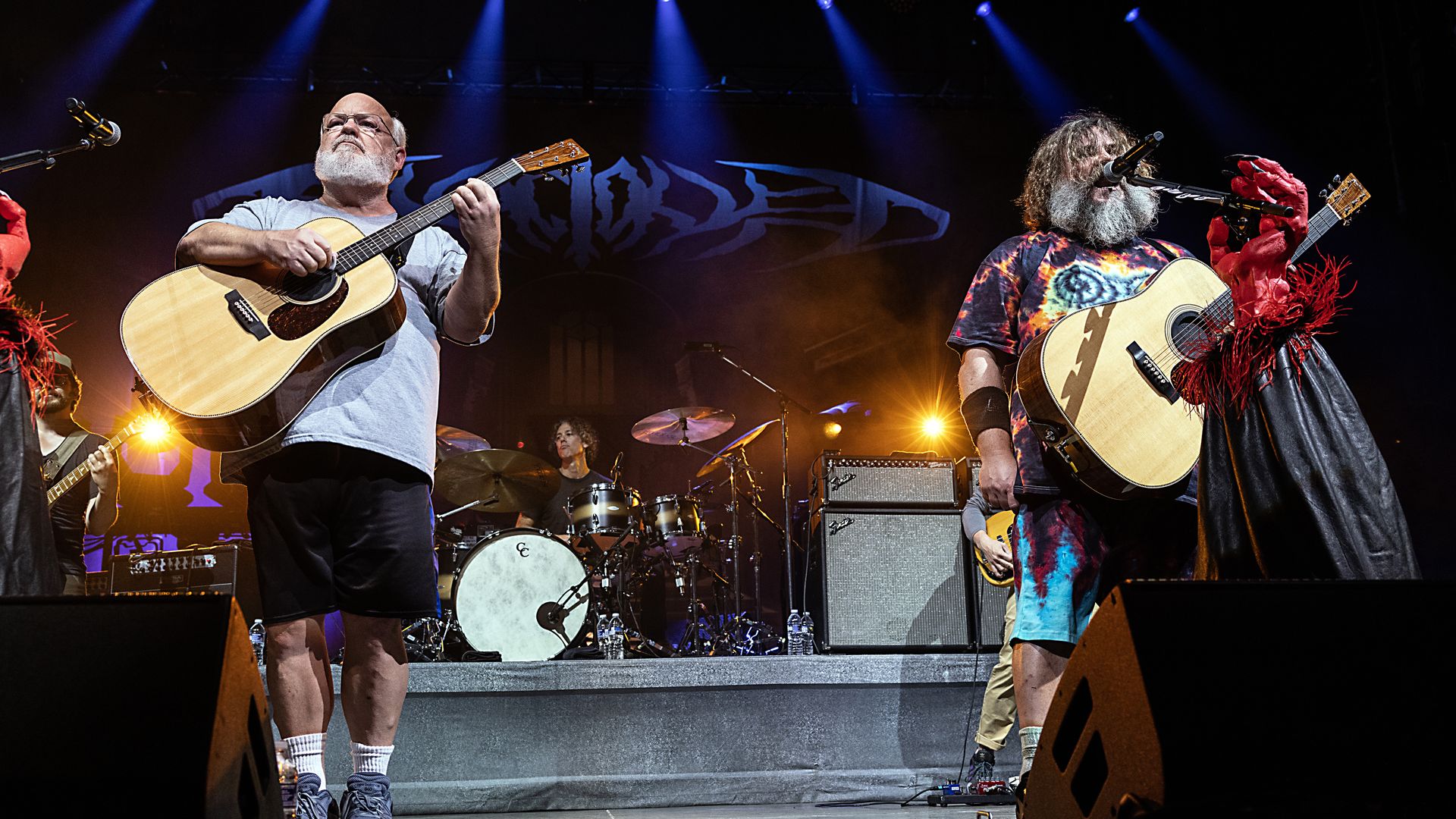 Jack Black and Kyle Gass perform at a Tenacious D concert.