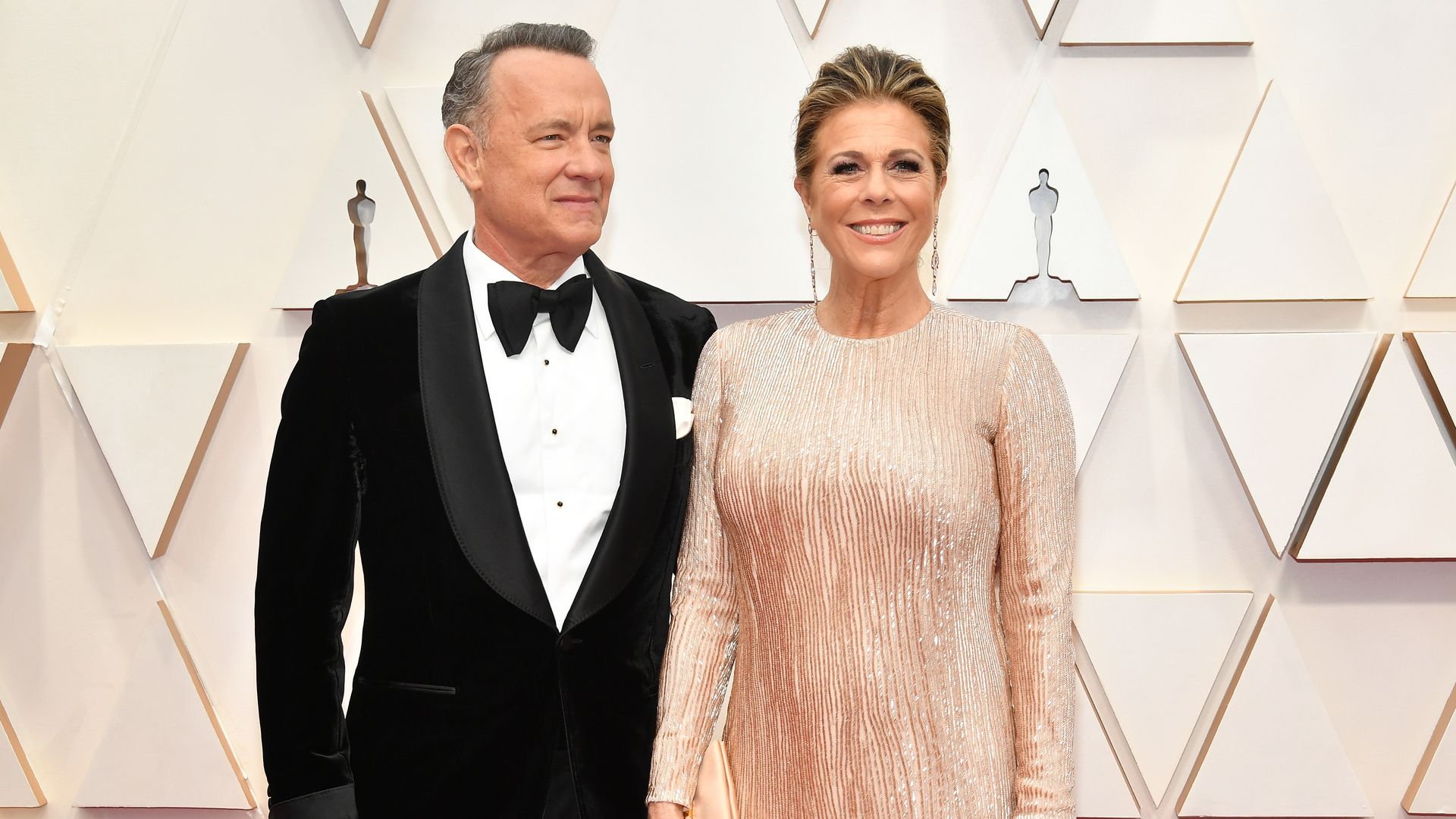 In this image, Tom Hanks and Rita Wilson stand next to each other 