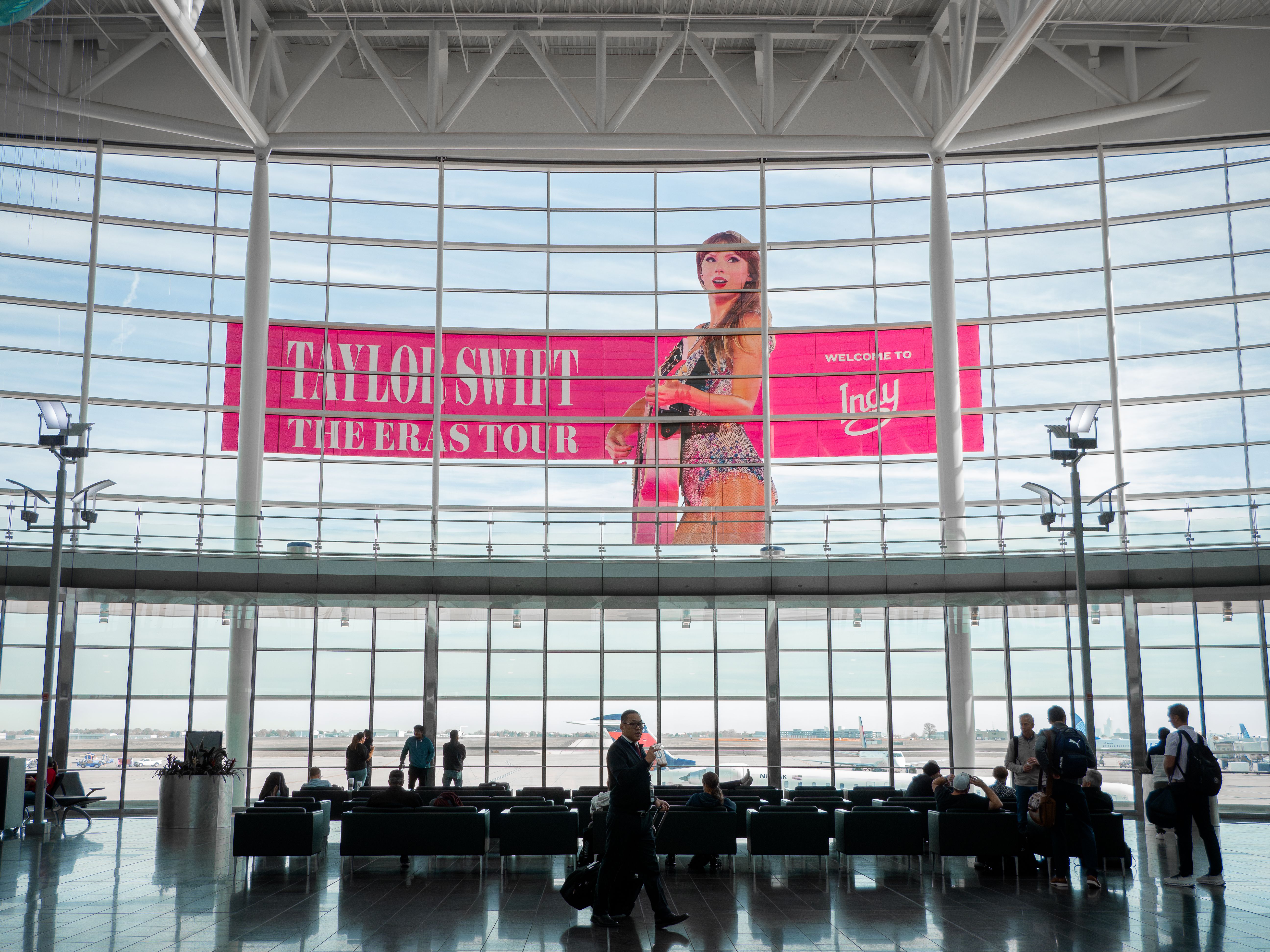 A welcome Taylor Swift sign at the airport