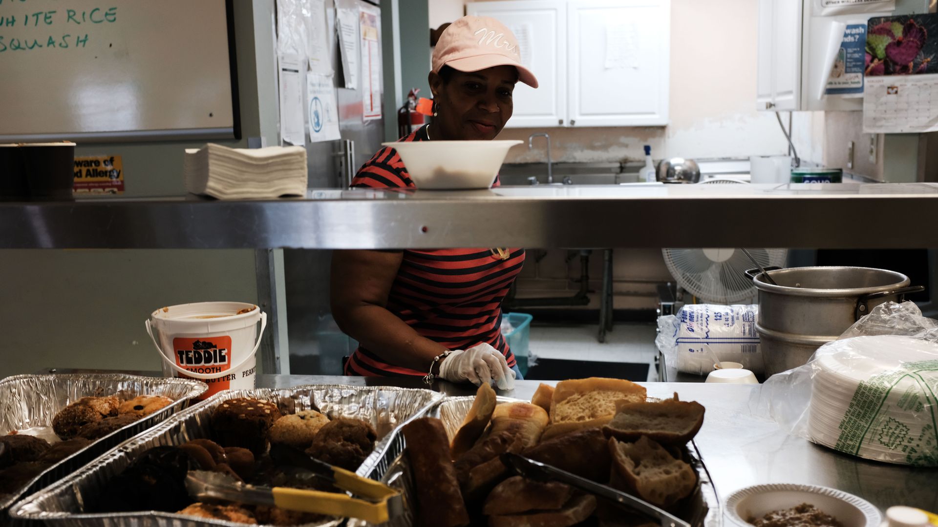 Breakfast is served at the Lazarus House Ministries morning soup kitchen on August 16