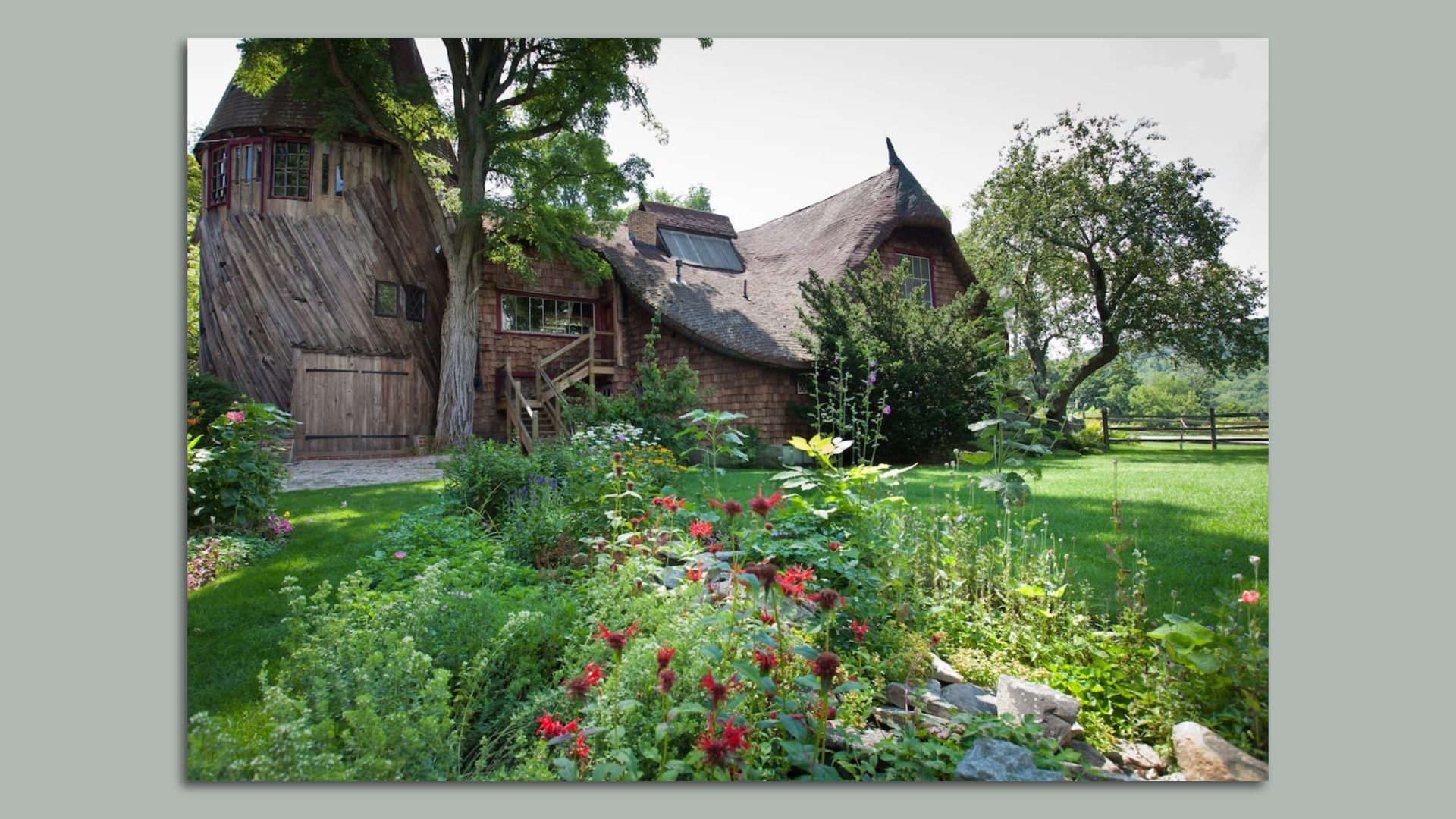 An exterior shot of a wooden house called the Gingerbread House on airbnb
