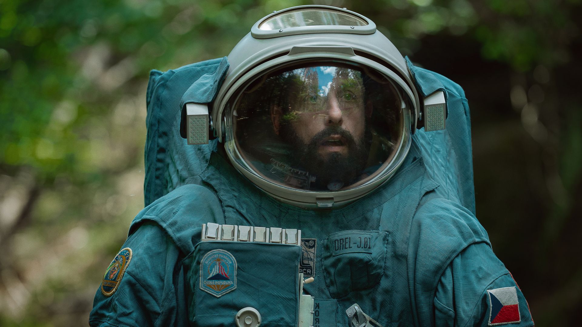 Shot of Adam Sandler in a space suit in his new movie "Spaceman"