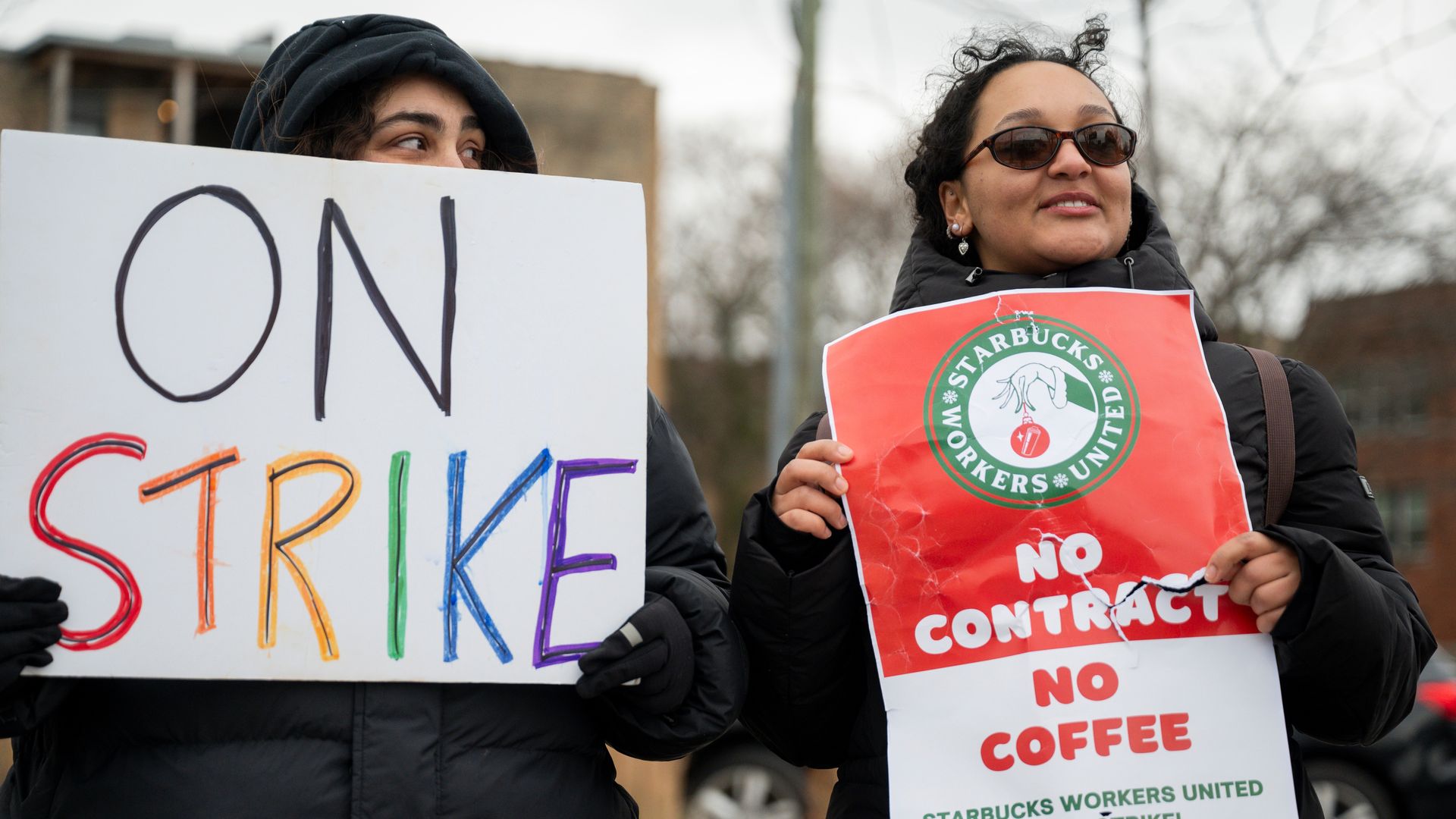 Starbucks Workers United members picket outside a Starbucks store in Chicago