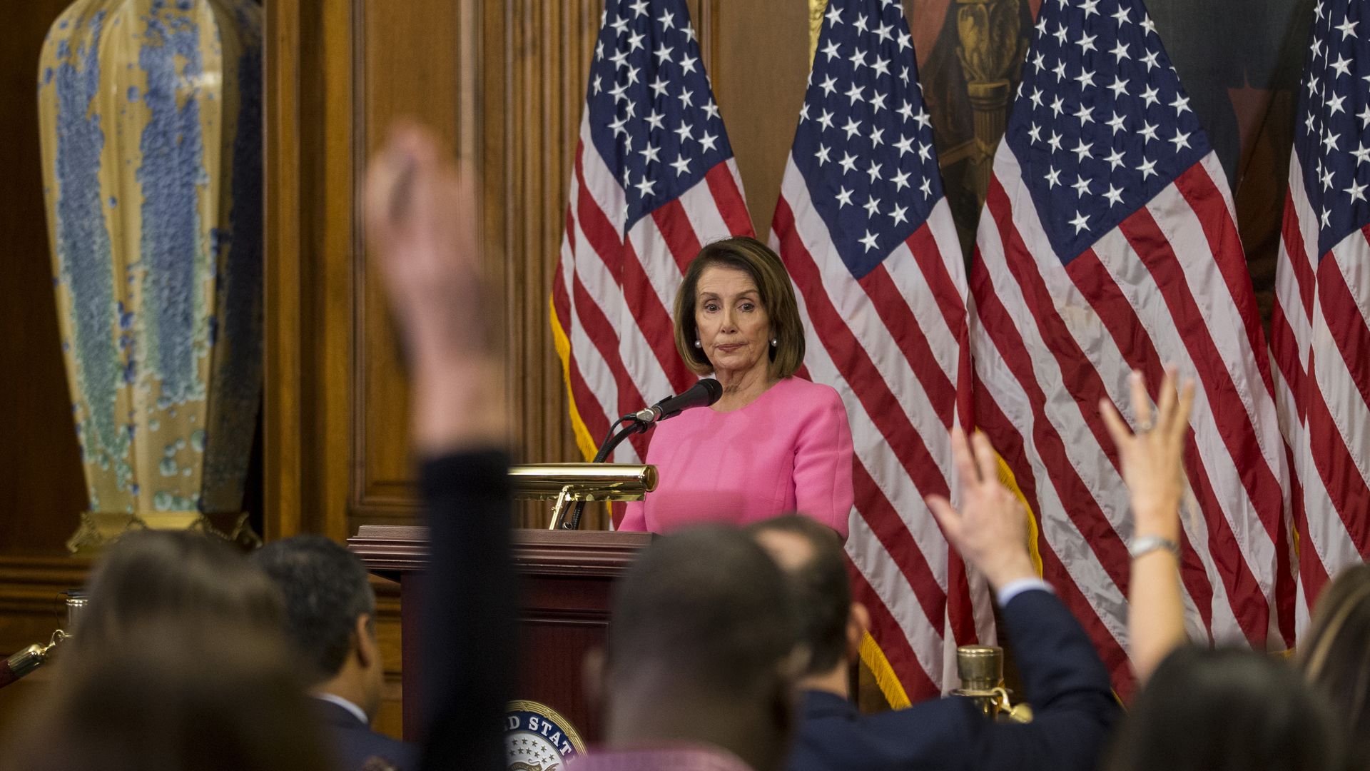 Nancy Pelosi speaking to a crowd.