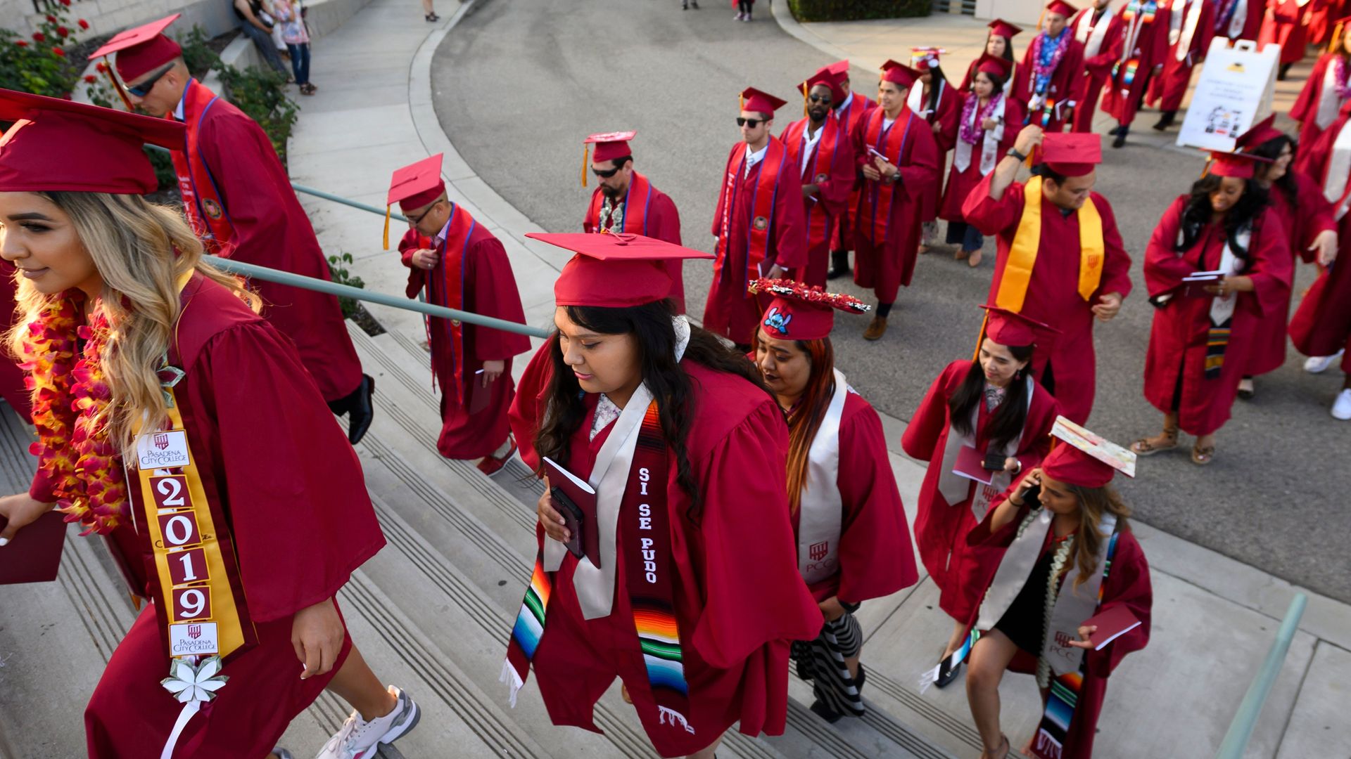 Students earning degrees at Pasadena City College participate in the graduation ceremony