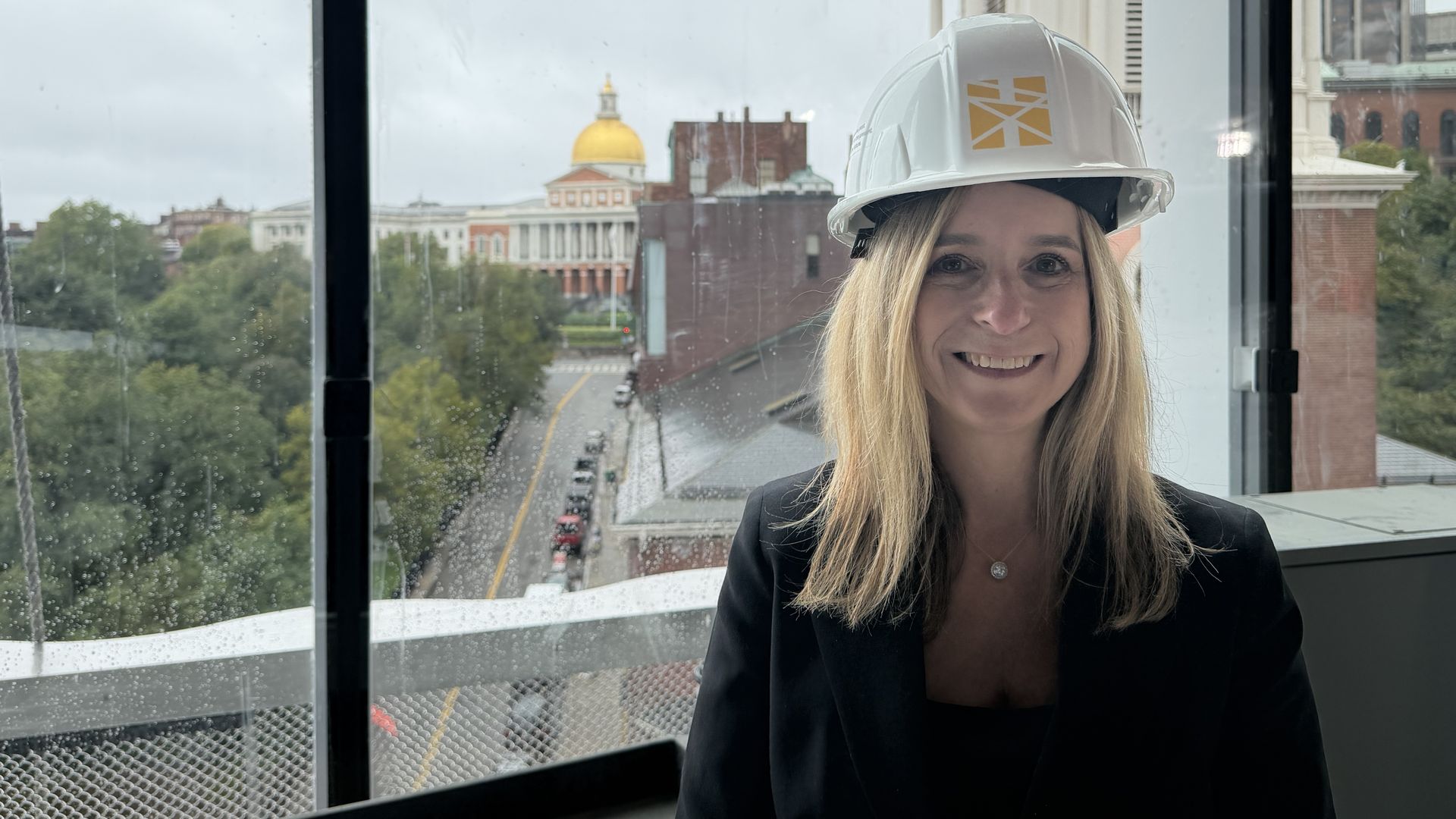 Jodi Kipnis, co-founder of Holocaust Museum Boston, stands on the top floor of the construction site on Sept. 28, 2026.