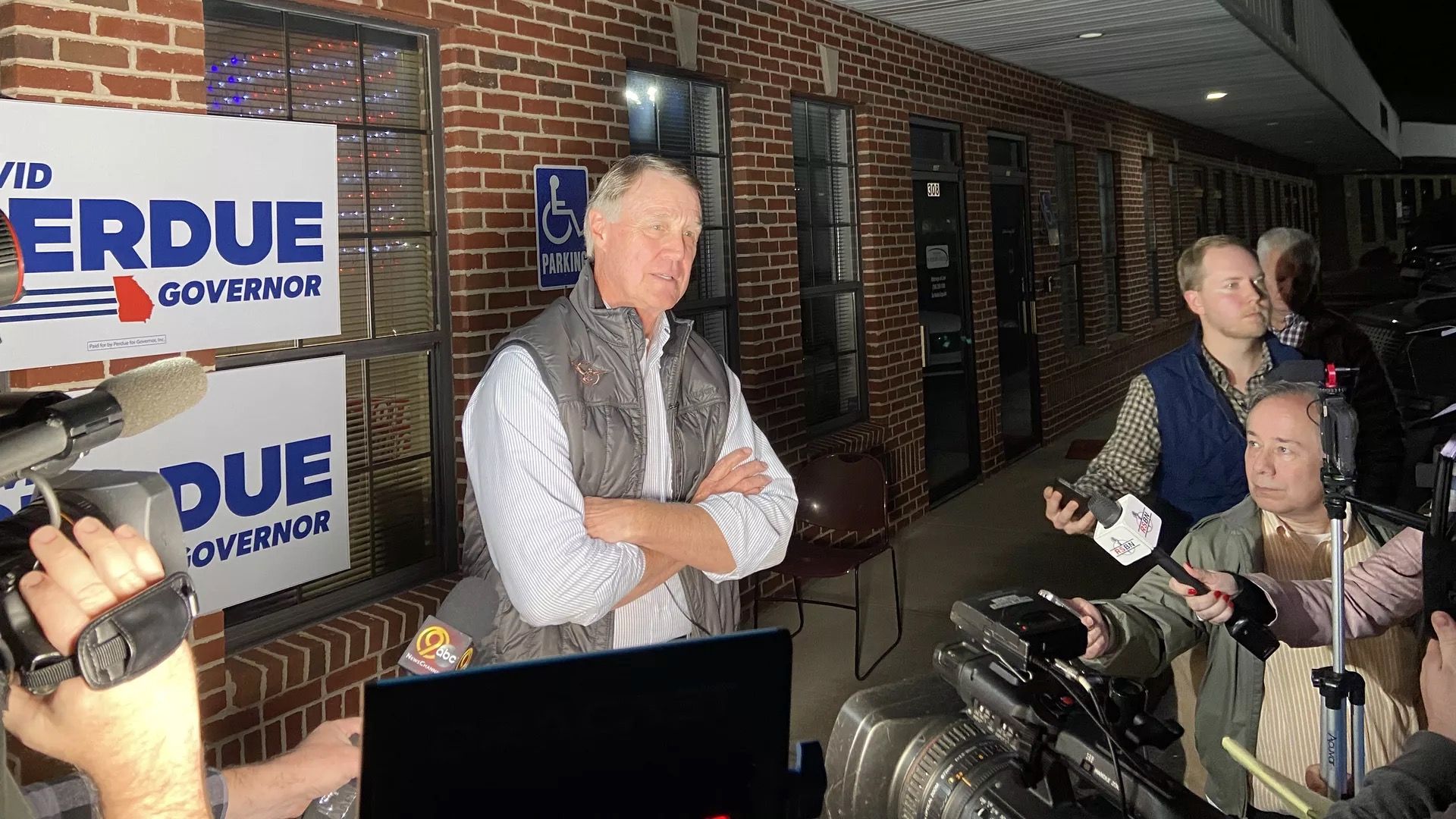 Georgia gubernatorial candidate David Perdue is seen speaking with reporters.