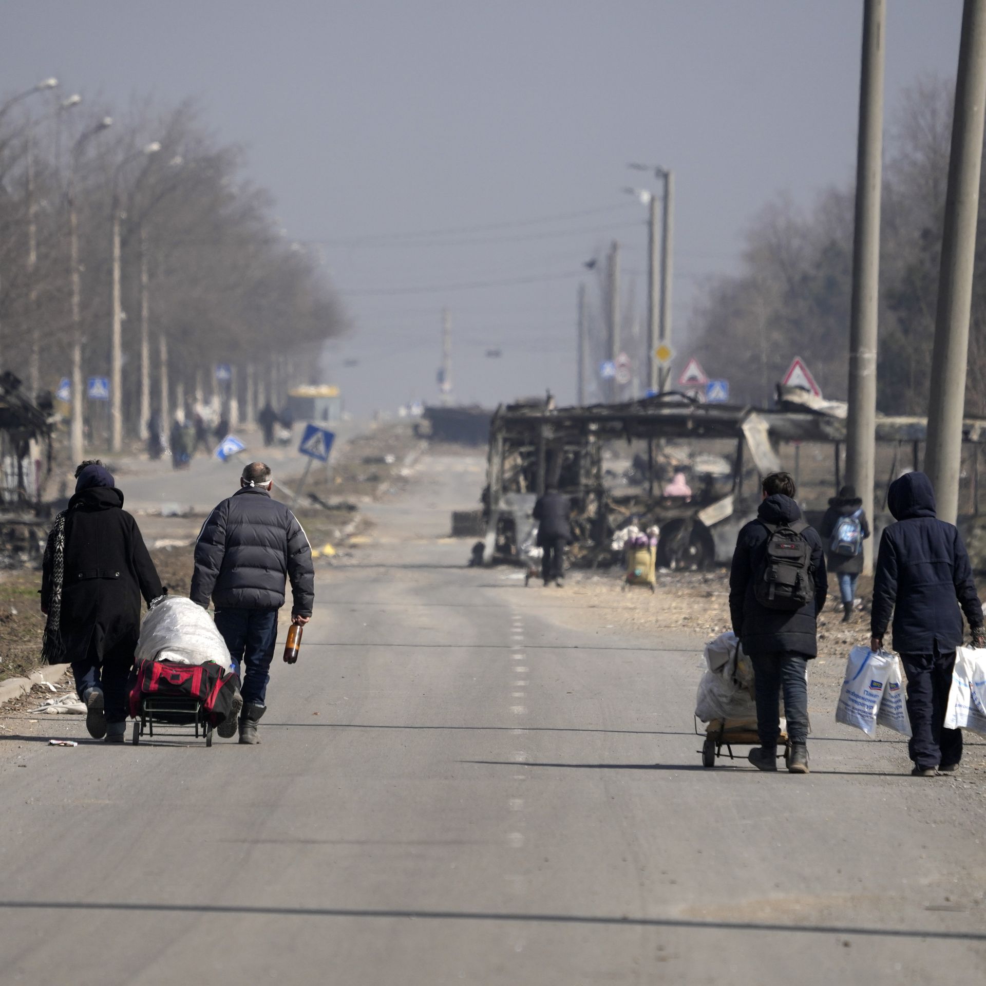 Civilians are being evacuated along humanitarian corridors from the Ukrainian city of Mariupol under the control of Russian military and pro-Russian separatists, on March 24, 2022