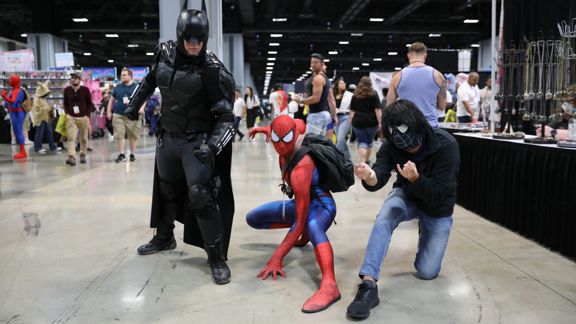 A photo showing people dressed in superhero costumes at Washington, D.C.'s Awesome Con event.